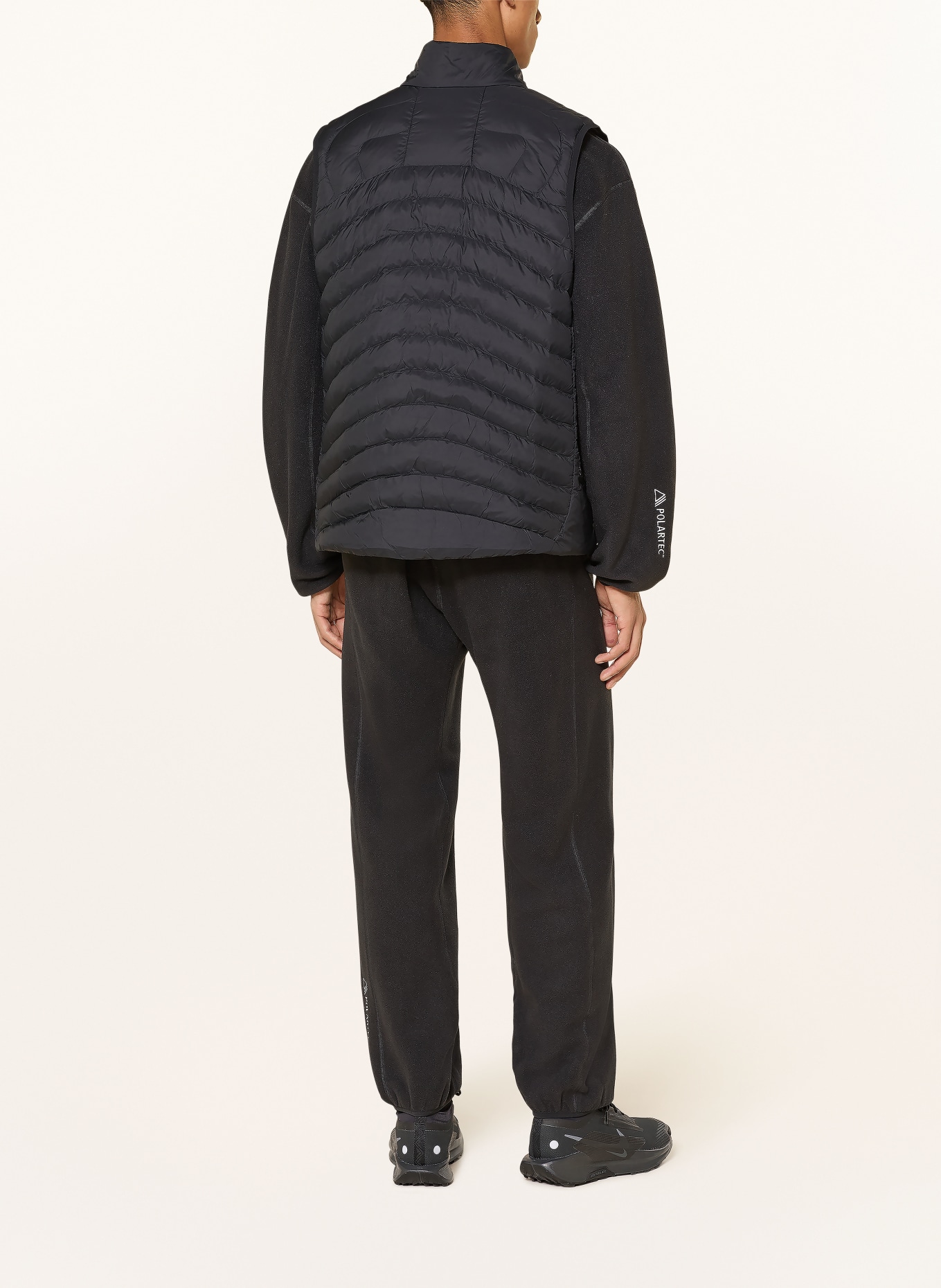 Nike Steppweste LAVA FLOW: SCHWARZ