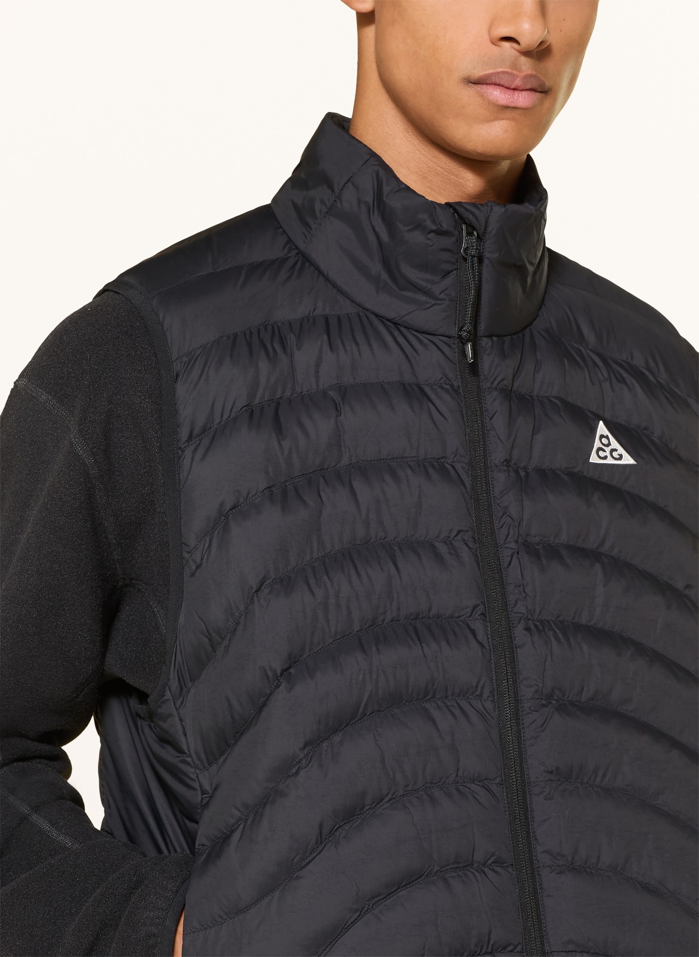 Nike Steppweste LAVA FLOW: SCHWARZ