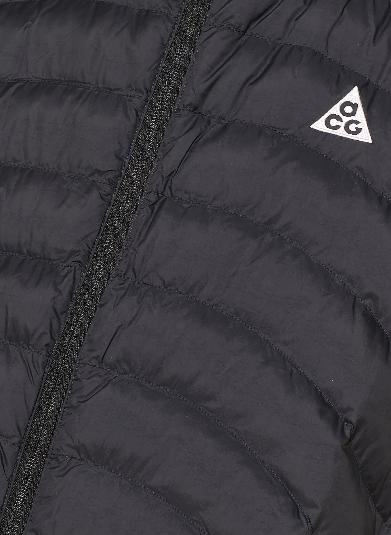 Nike Steppweste LAVA FLOW: SCHWARZ