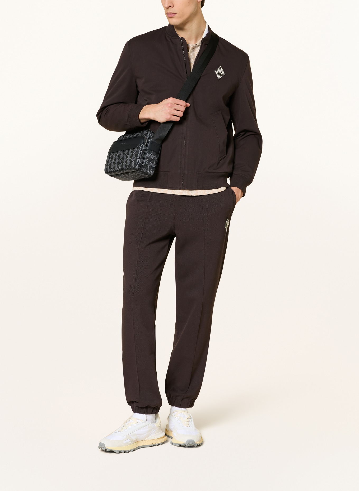 LACOSTE Schoudertas REPORTER BAG: ZWART / ZILVER / LICHTGRIJS