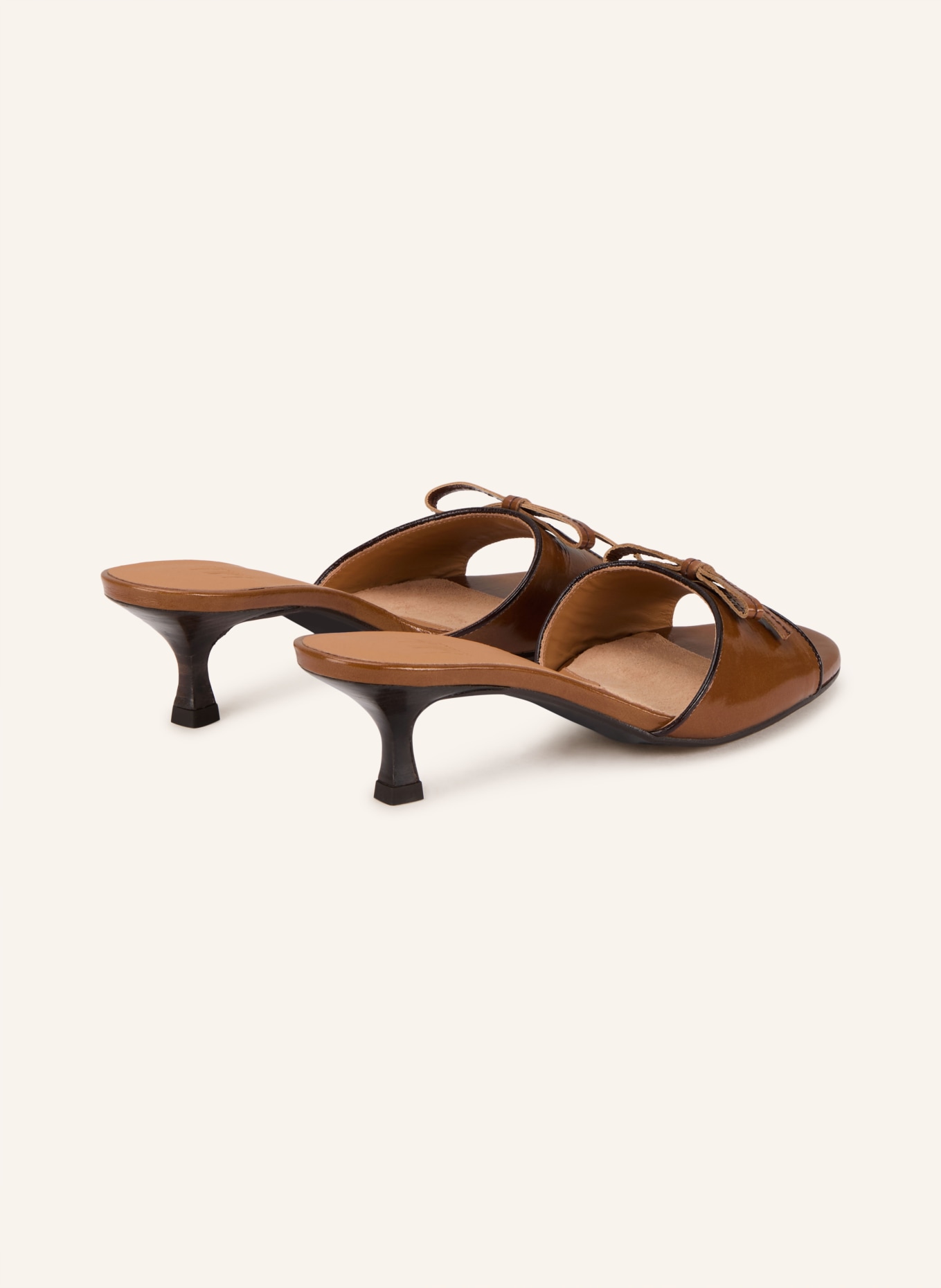 billi bi Mules: COGNAC / SCHWARZ
