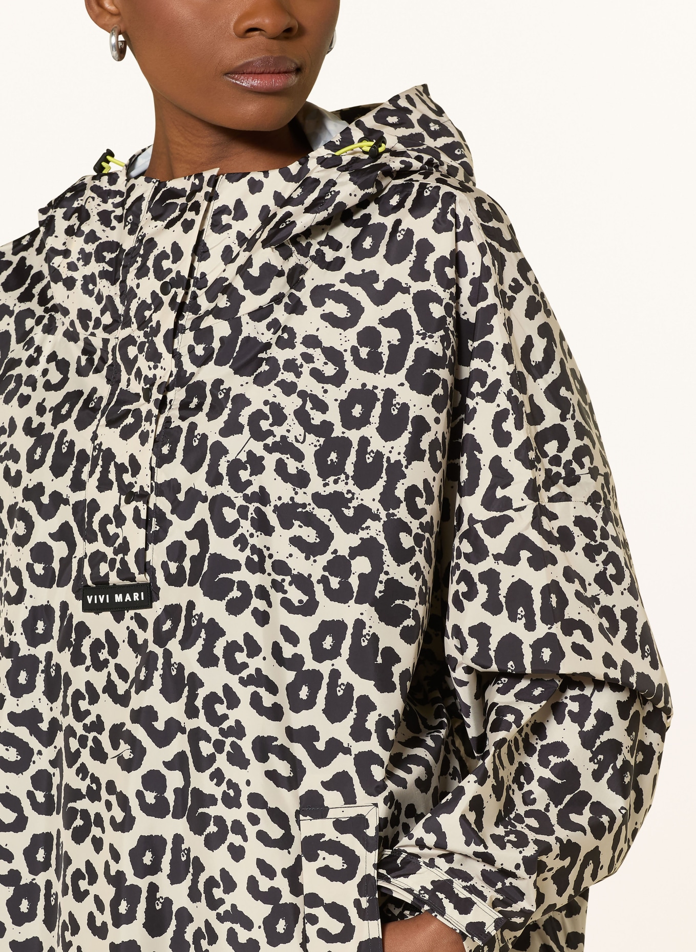 VIVI MARI Regenmantel: SCHWARZ / CREME