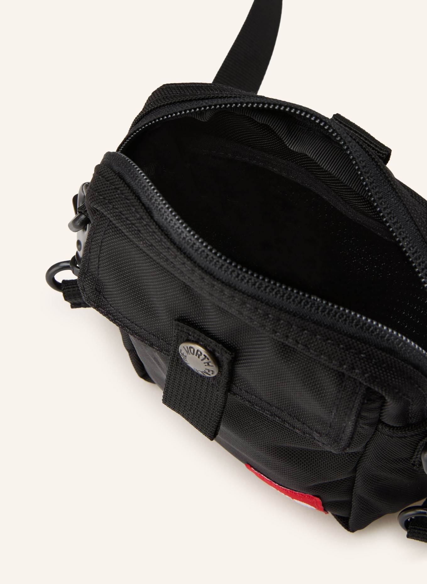 THE NORTH FACE Taška přes rameno REDBOX SMALL: ČERNÁ