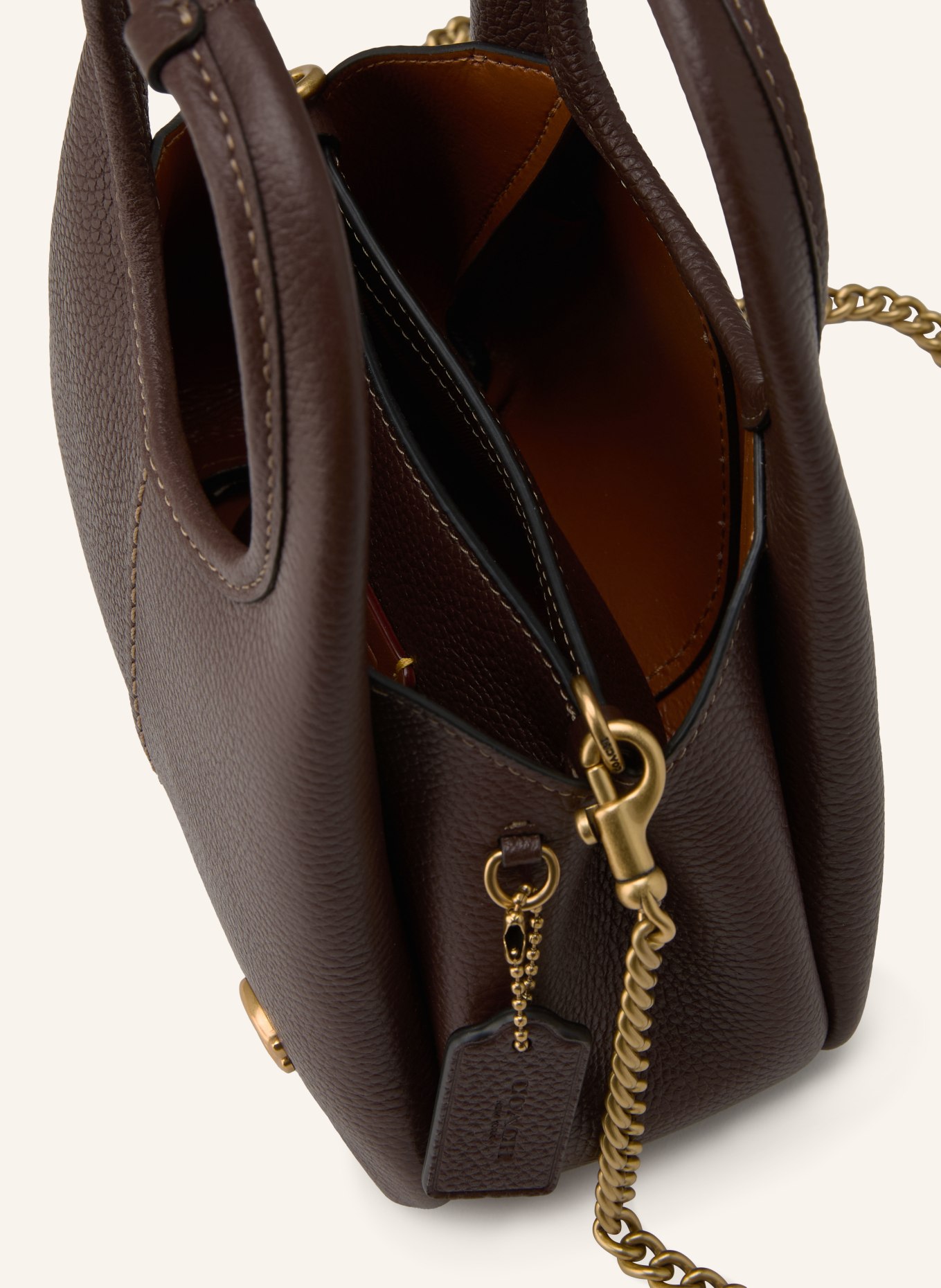 COACH Mikro taška LANA: TMAVĚ HNĚDÁ