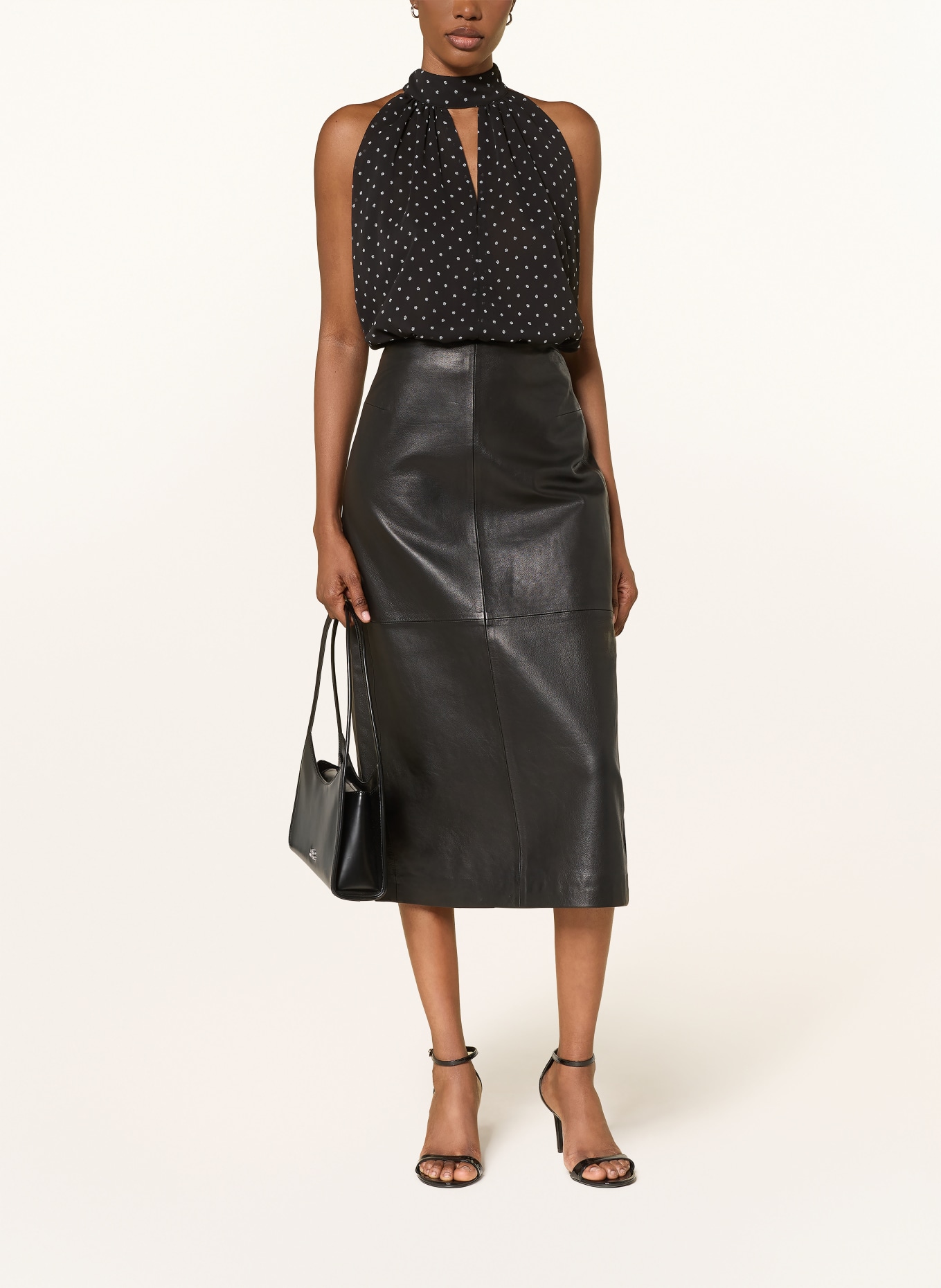 ROTATE Blusentop mit Cut-out: SCHWARZ / WEISS