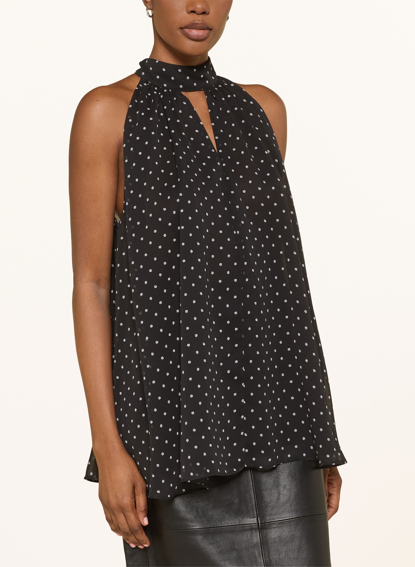 ROTATE Blusentop mit Cut-out: SCHWARZ / WEISS