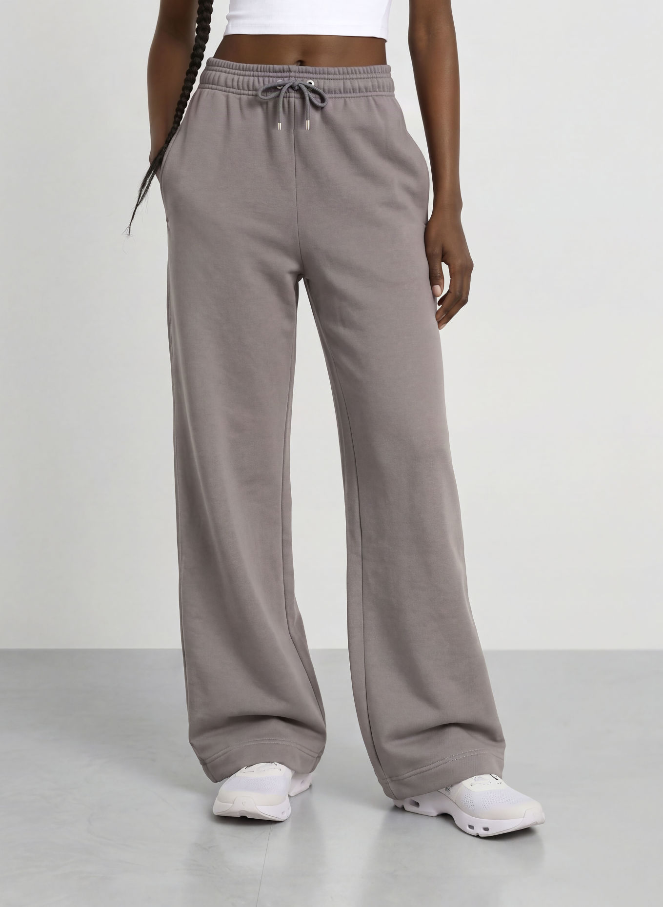 On CLUB COLLECTIVE Sweatpants: DARK GRAY