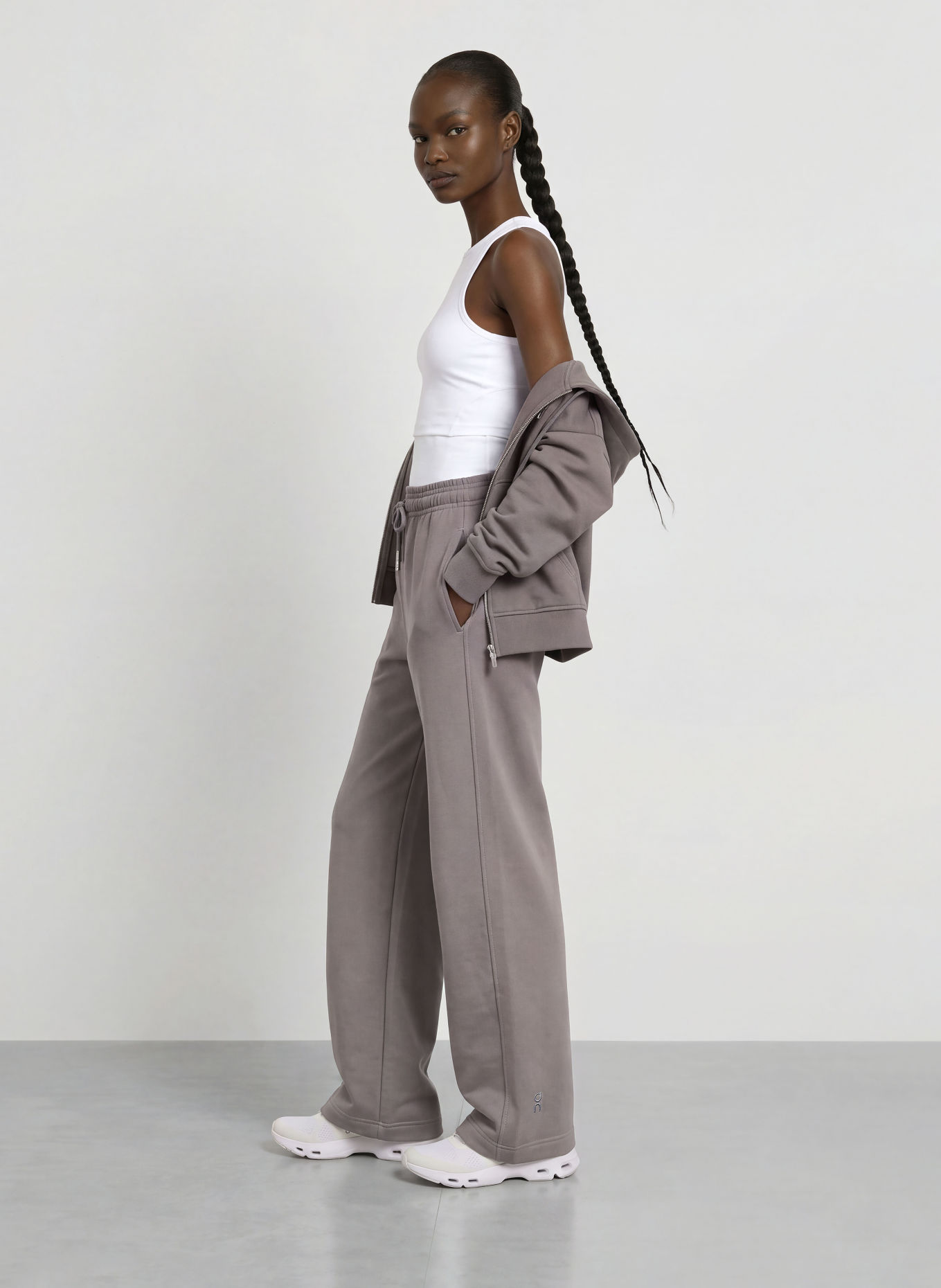 On CLUB COLLECTIVE Sweatpants: DARK GRAY