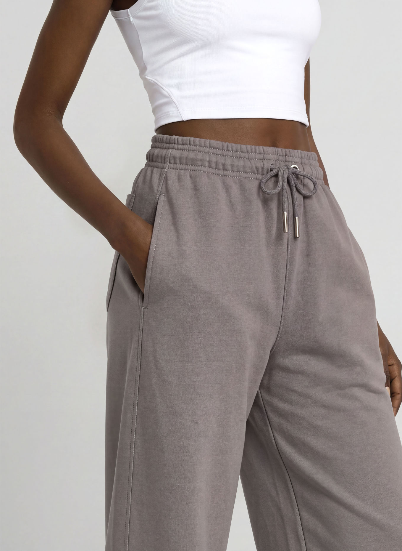 On CLUB COLLECTIVE Sweatpants: DARK GRAY