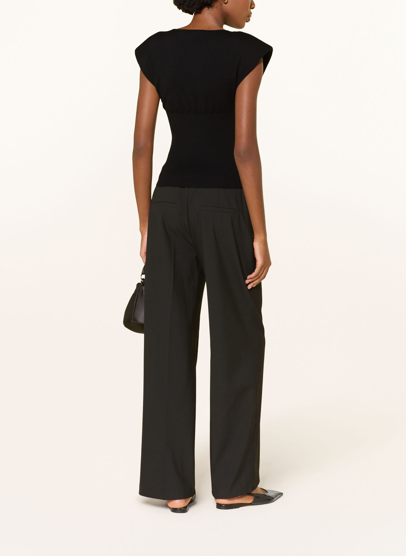 LIVY CYCLONE Knit Top: BLACK