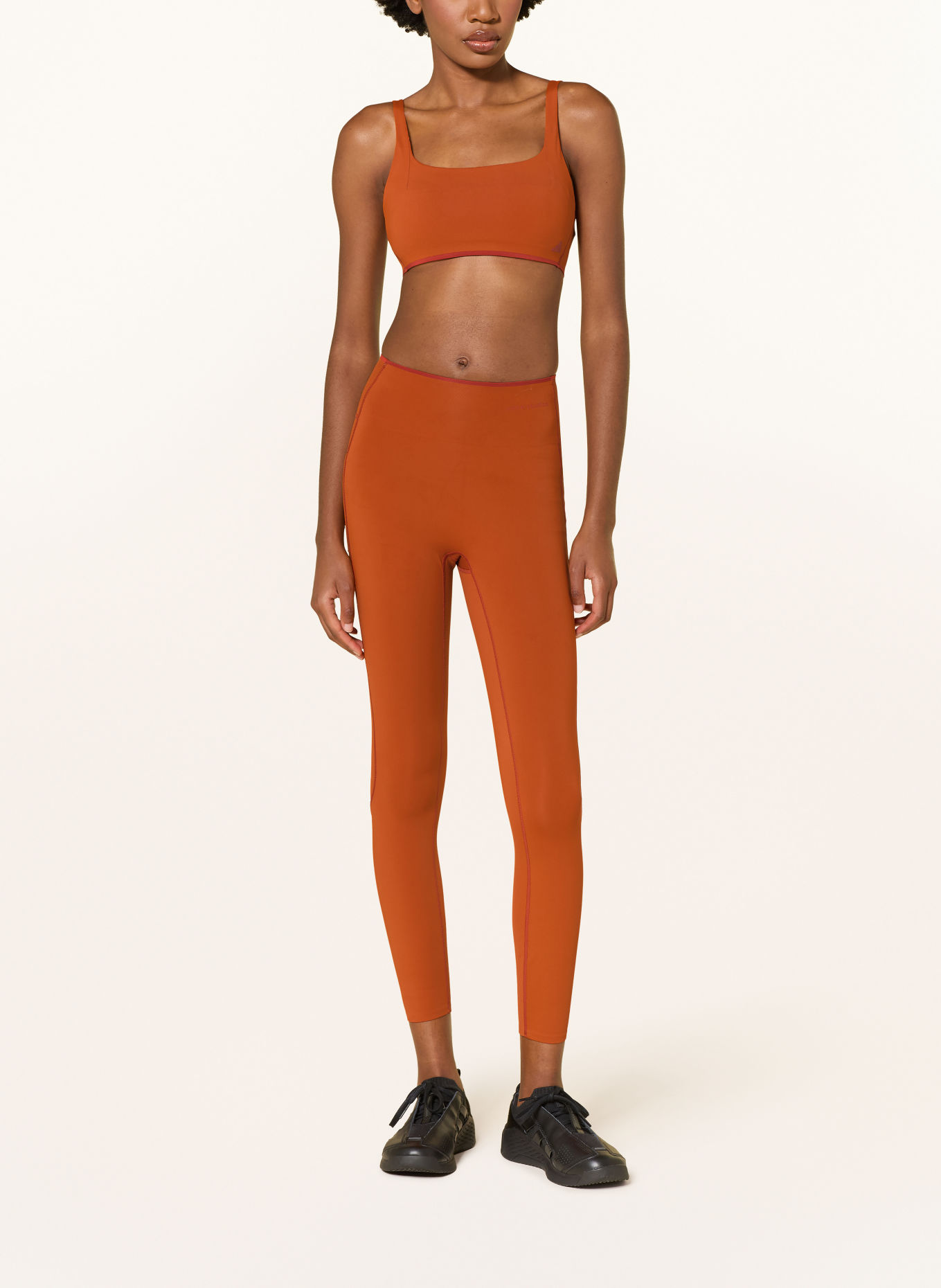 adidas Sport-bh ADIDAS X ENTIRE STUDIOS OPTIME: DONKERORANJE / DONKERROOD