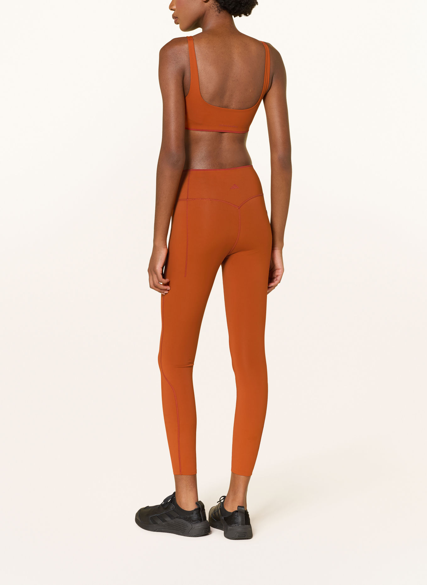 adidas Sport-bh ADIDAS X ENTIRE STUDIOS OPTIME: DONKERORANJE / DONKERROOD