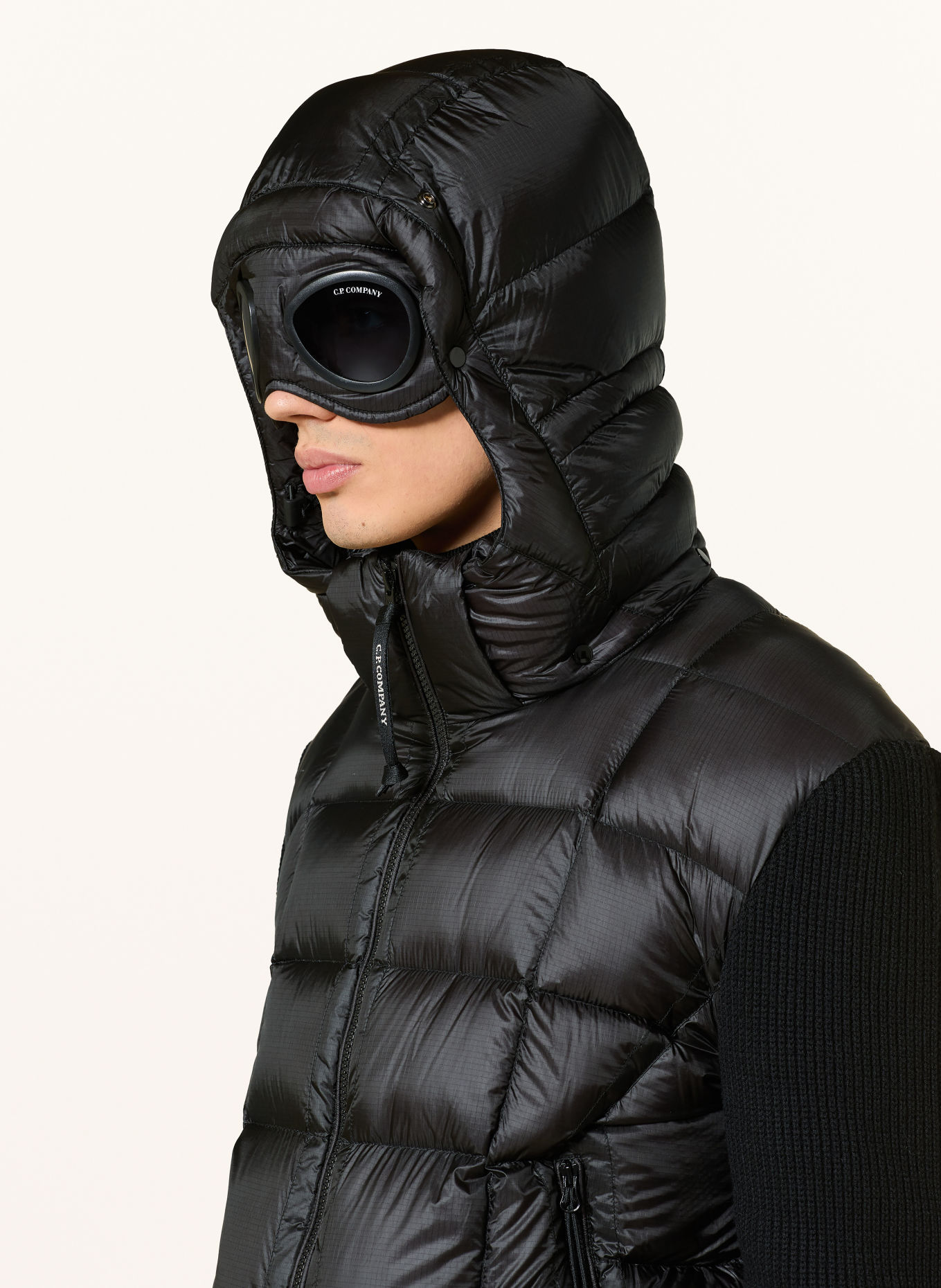 C.P. COMPANY Down jacket made from a blend of materials including merino wool: BLACK