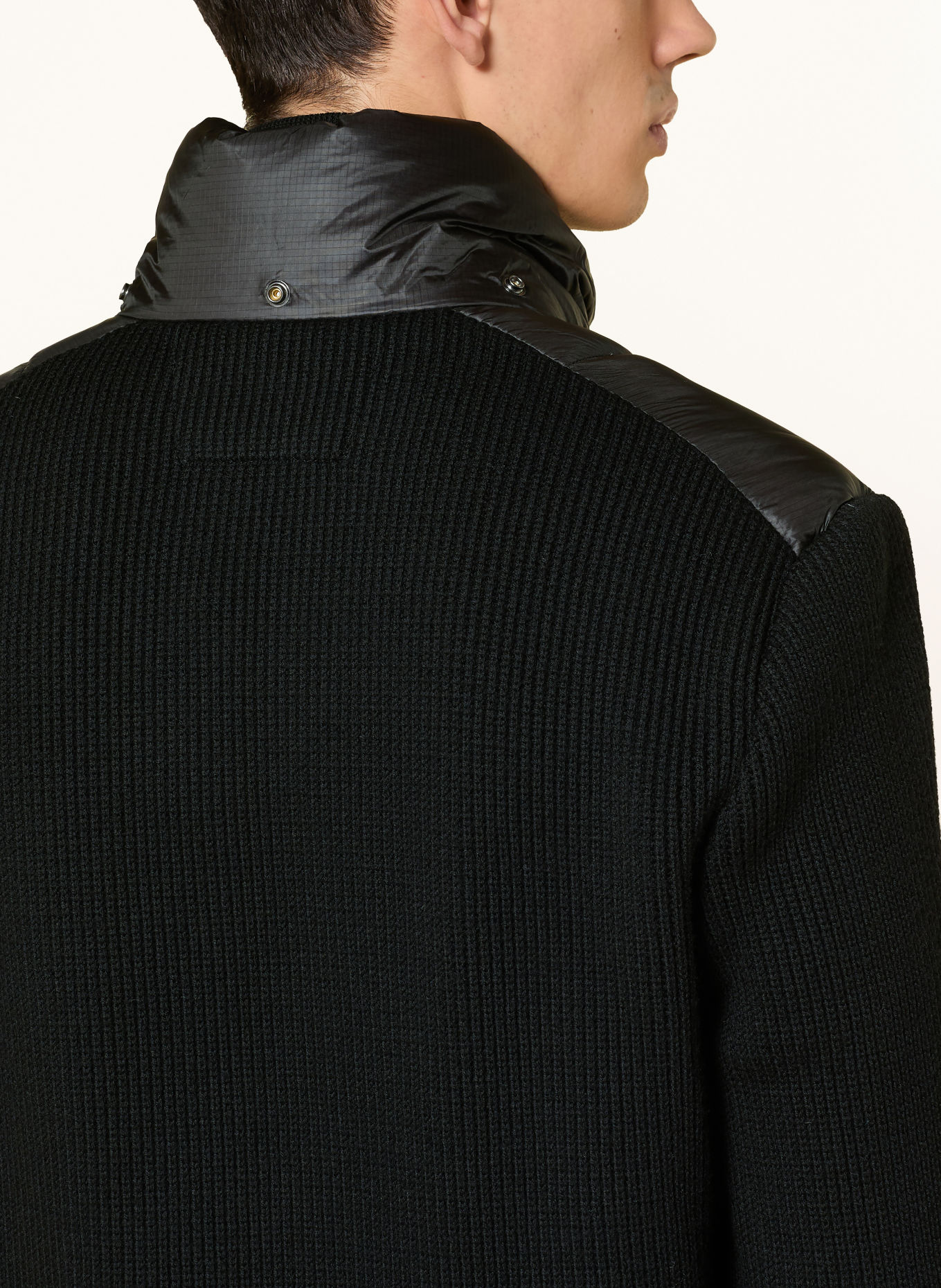 C.P. COMPANY Down jacket made from a blend of materials including merino wool: BLACK