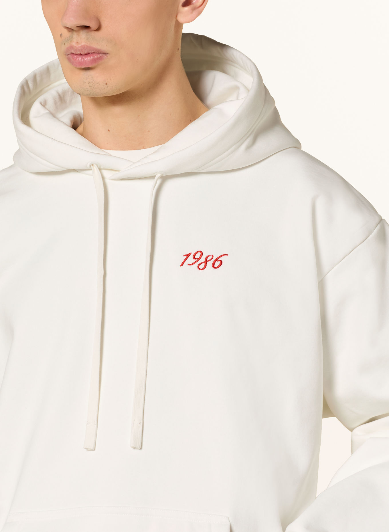 Peak Performance Hoodie 40TH GRAPHIC: WEISS / ROT