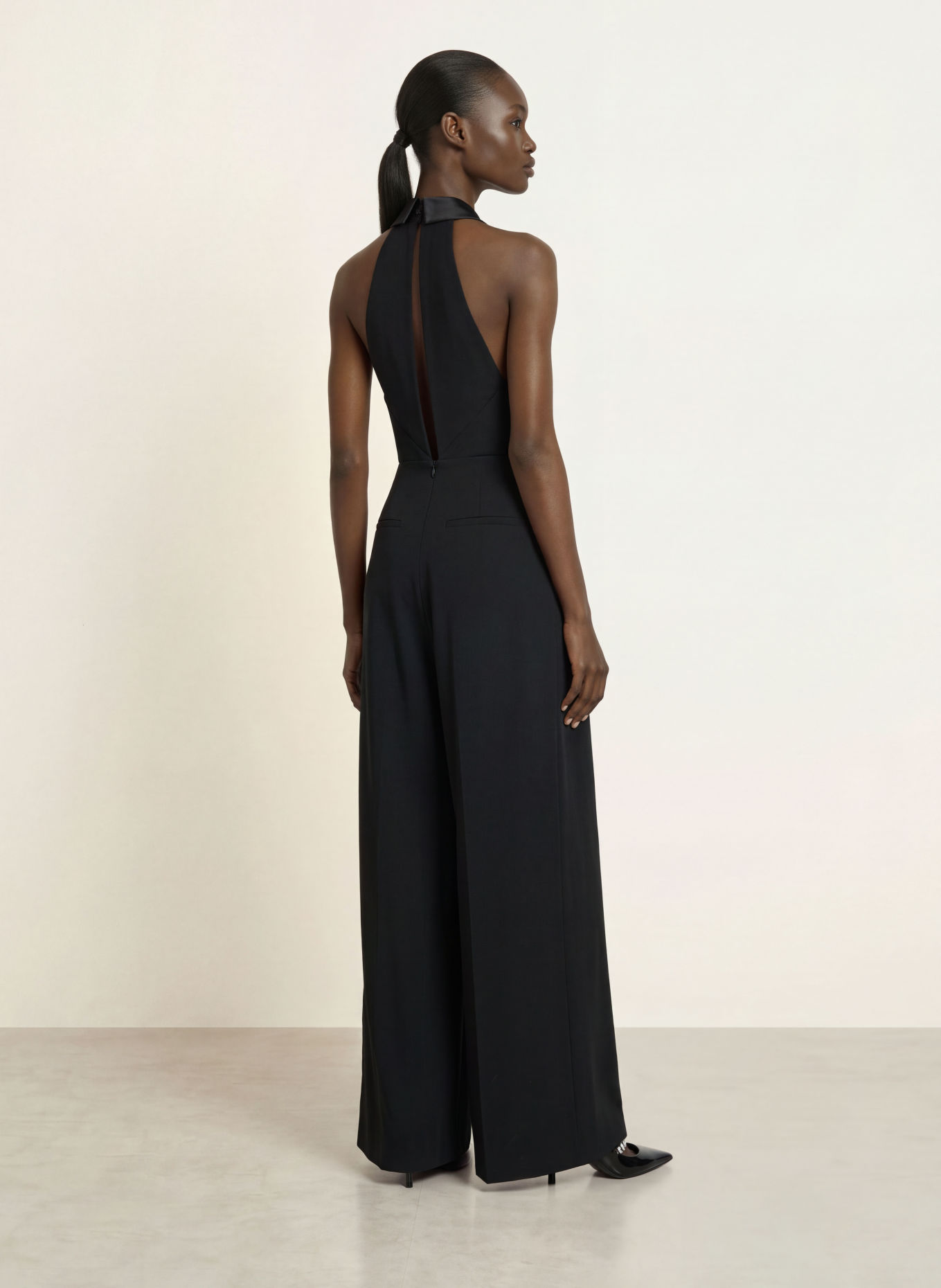 RIANI Wrap-style jumpsuit with rhinestones: BLACK