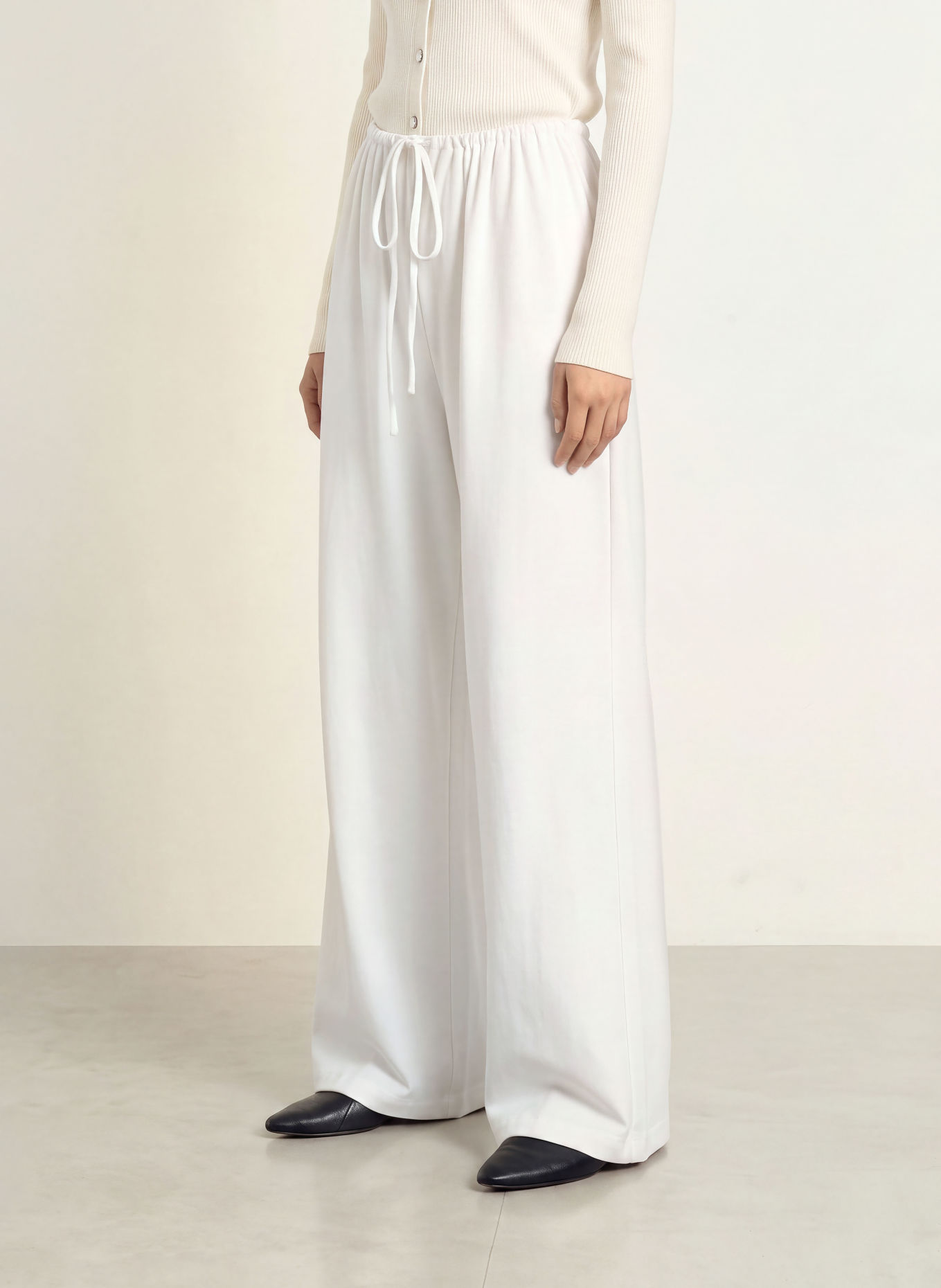 NINETY-9 MELLOW Jersey Trousers: WHITE
