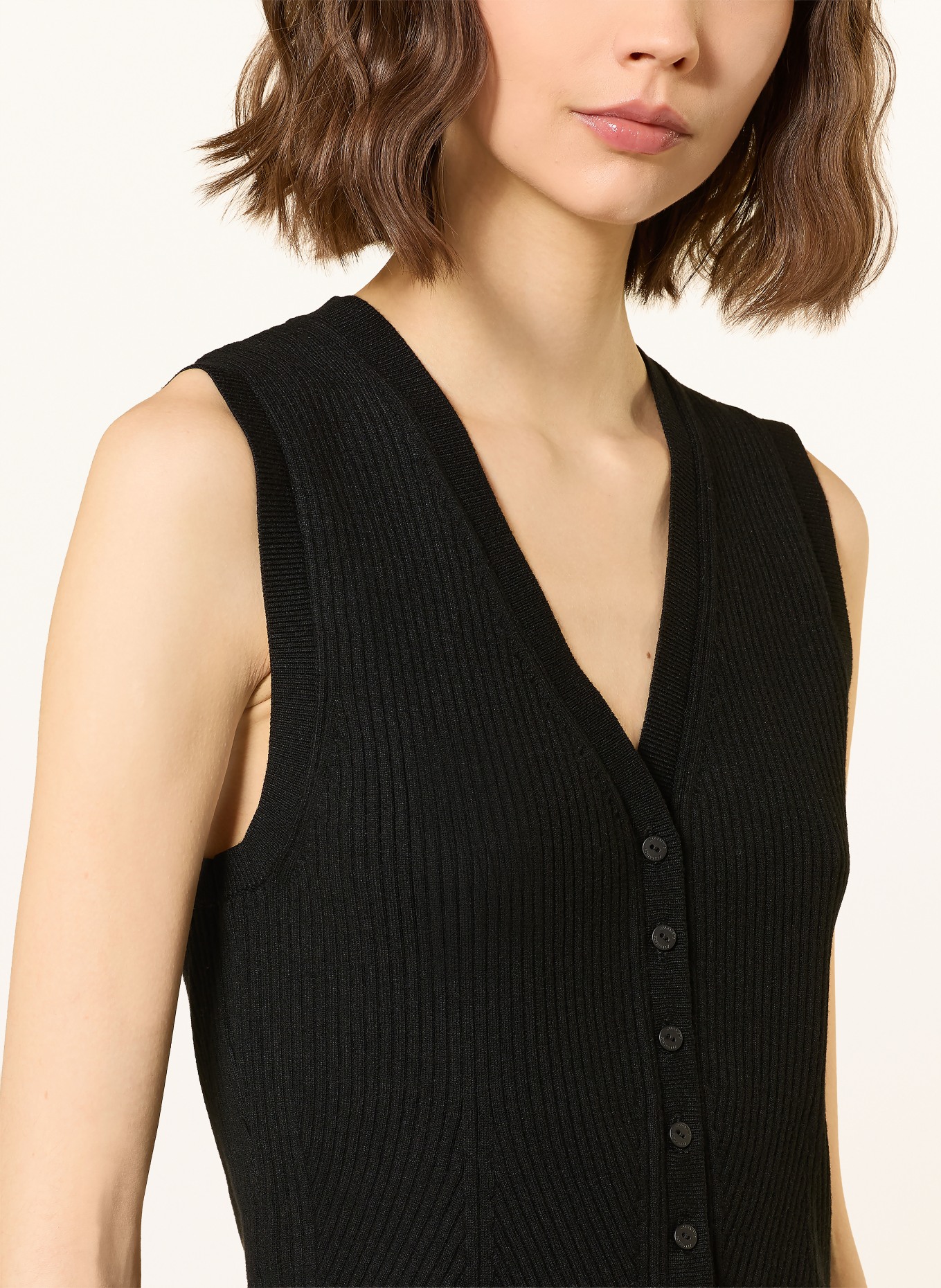 ALLSAINTS Pletená vesta CRUZ: ČERNÁ