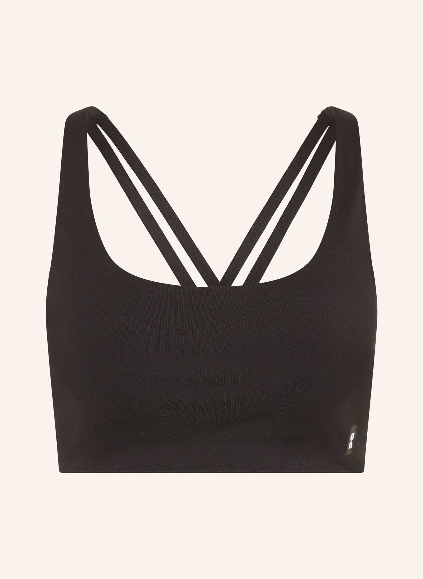 On STUDIO sports bra: BLACK