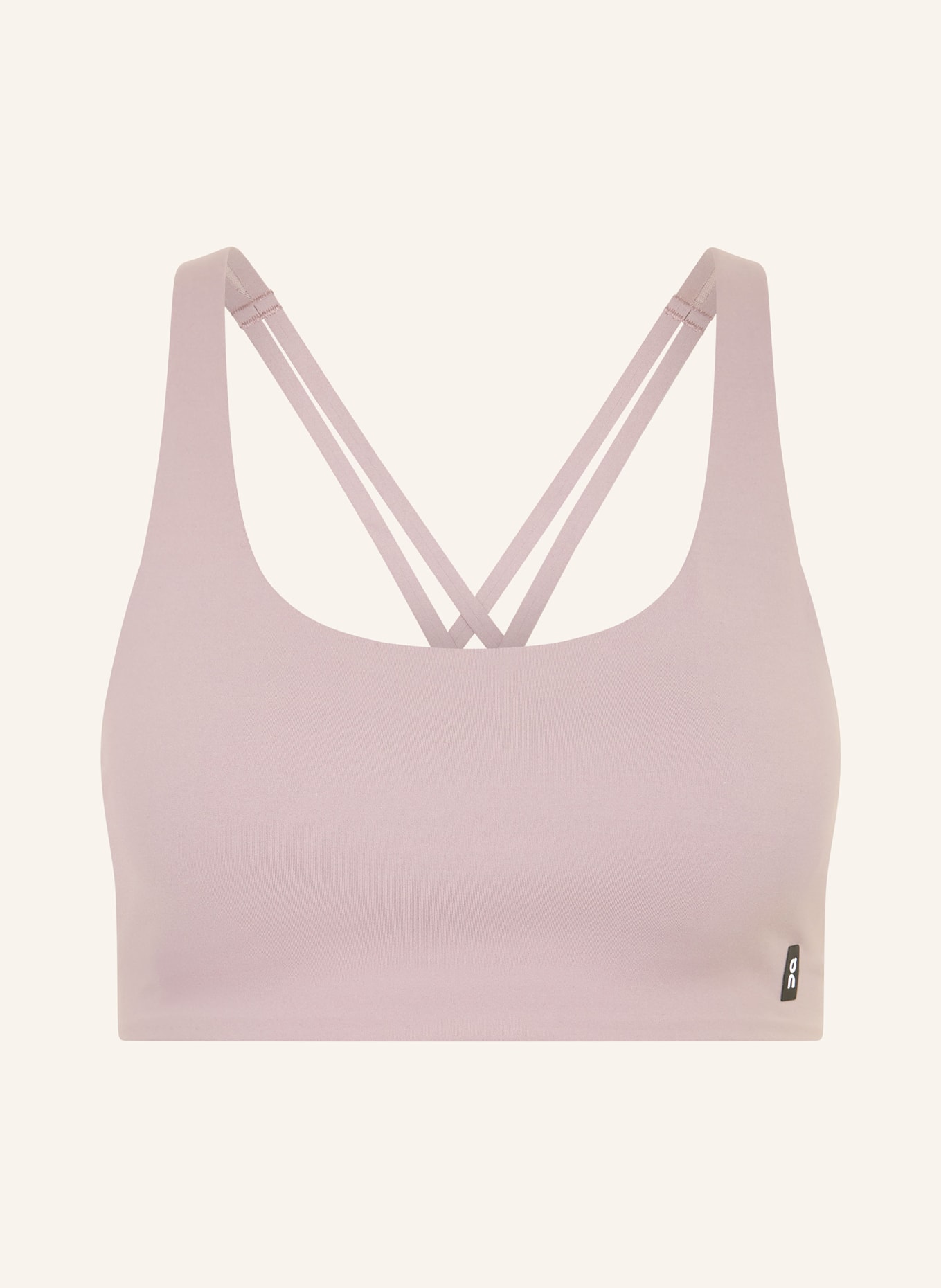 On STUDIO sports bra: LIGHT PURPLE