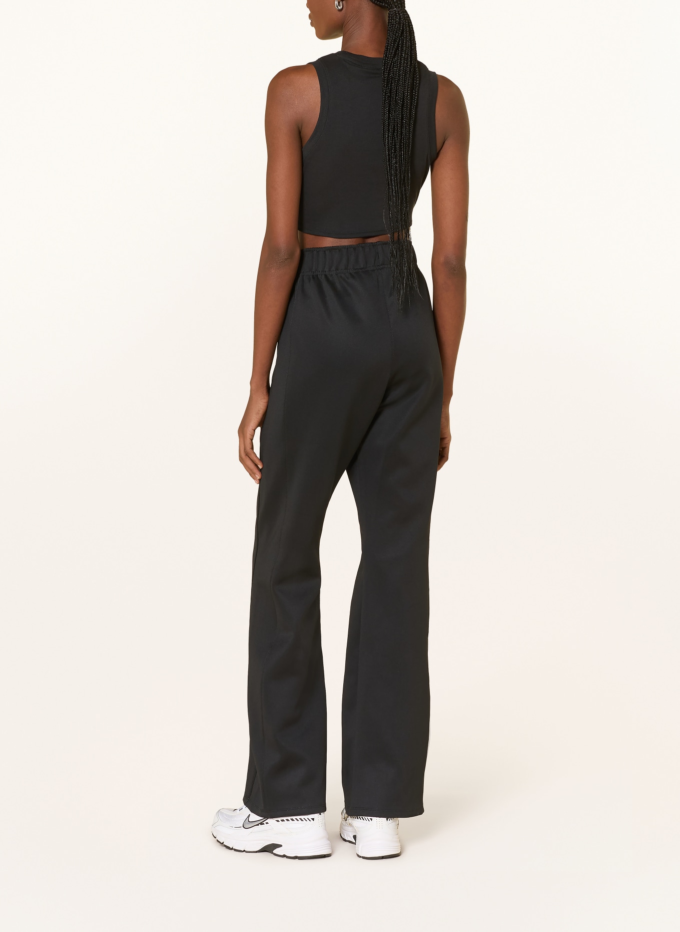 Nike Tréninkové kalhoty SPORTSWEAR: ČERNÁ