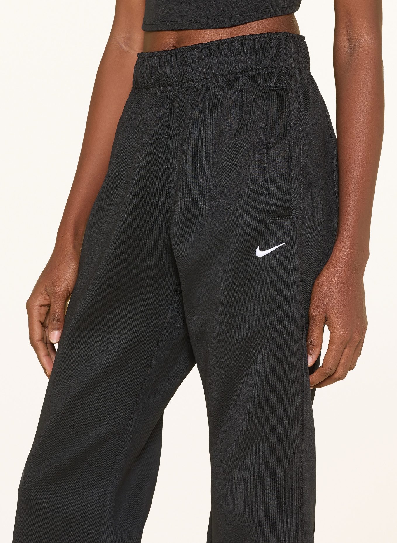 Nike Tréninkové kalhoty SPORTSWEAR: ČERNÁ