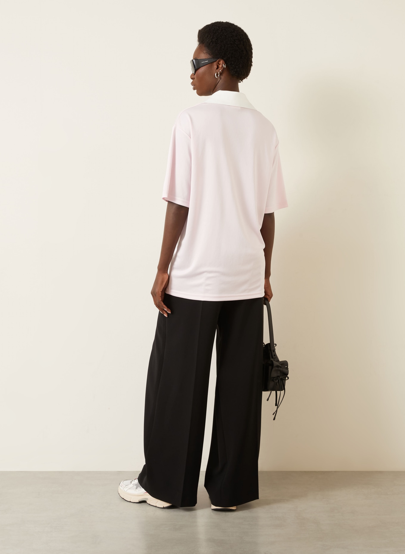 Courrèges Oversized-Poloshirt aus Jersey: ROSA / WEISS
