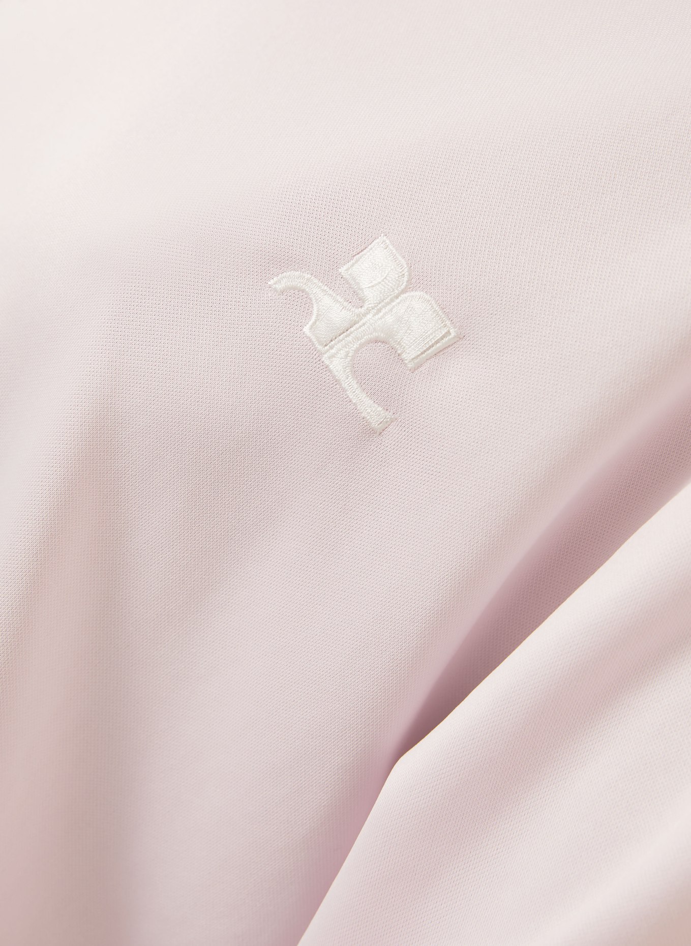 Courrèges Oversized-Poloshirt aus Jersey: ROSA / WEISS