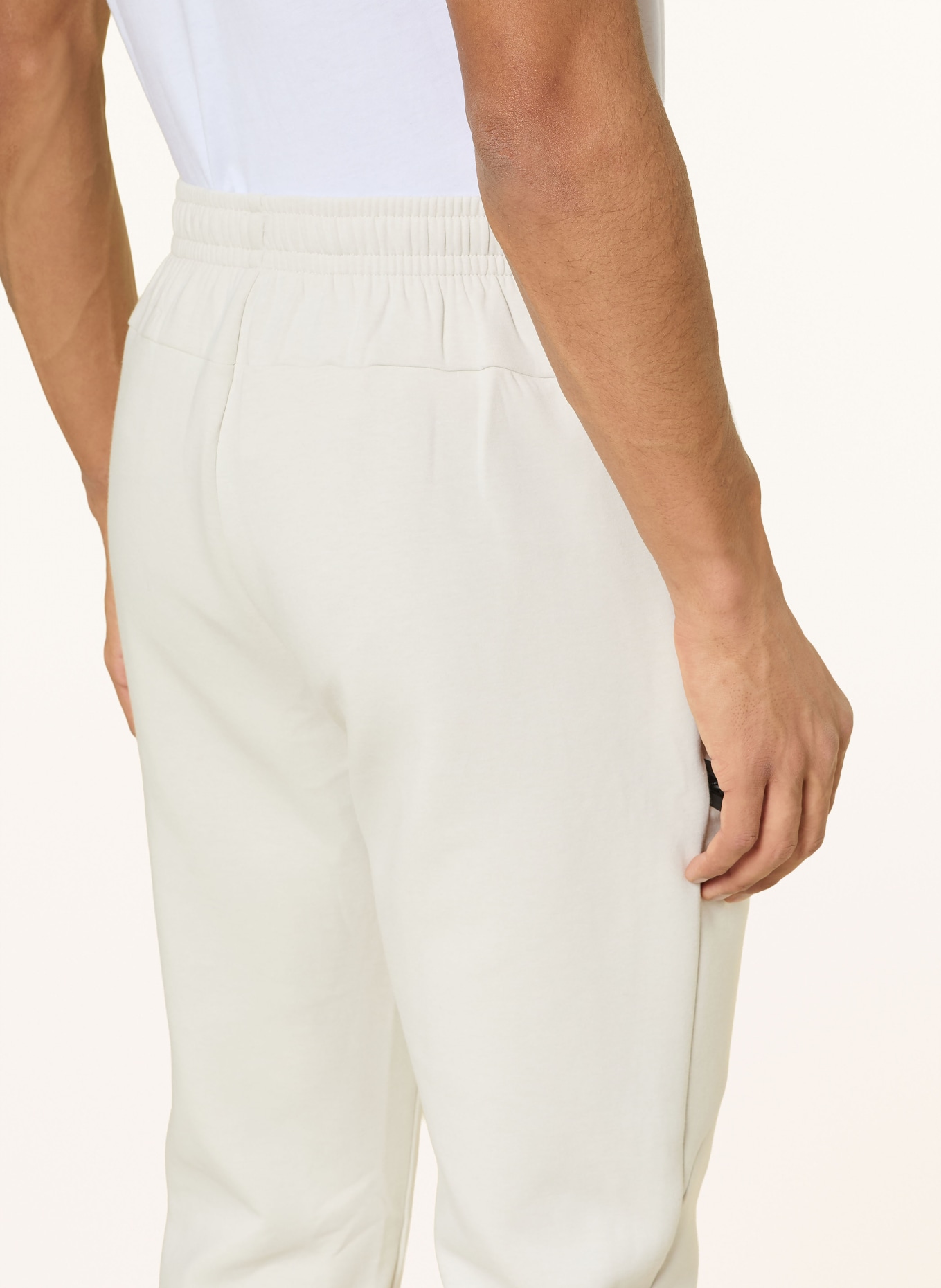 UNDER ARMOUR Spodnie dresowe UA UNSTOPPABLE: KREMOWY