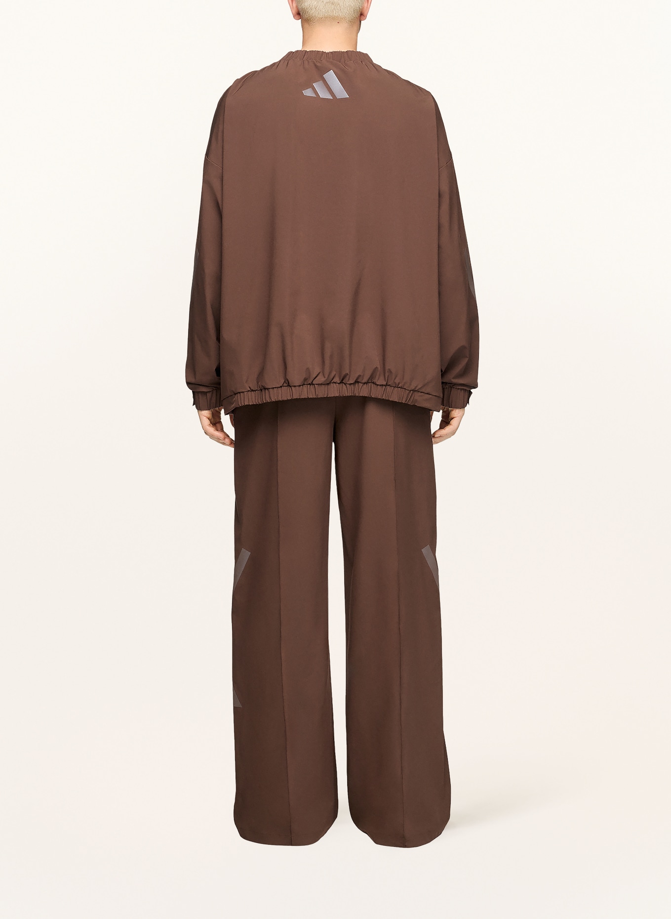 adidas Tréninkové kalhoty Z.N.E.: TMAVĚ HNĚDÁ