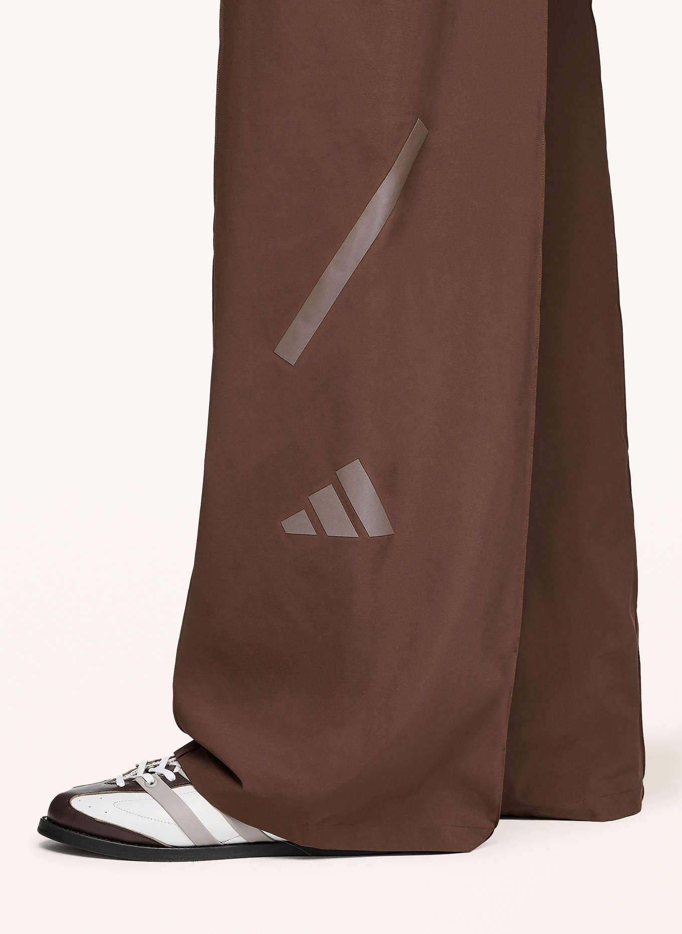 adidas Tréninkové kalhoty Z.N.E.: TMAVĚ HNĚDÁ