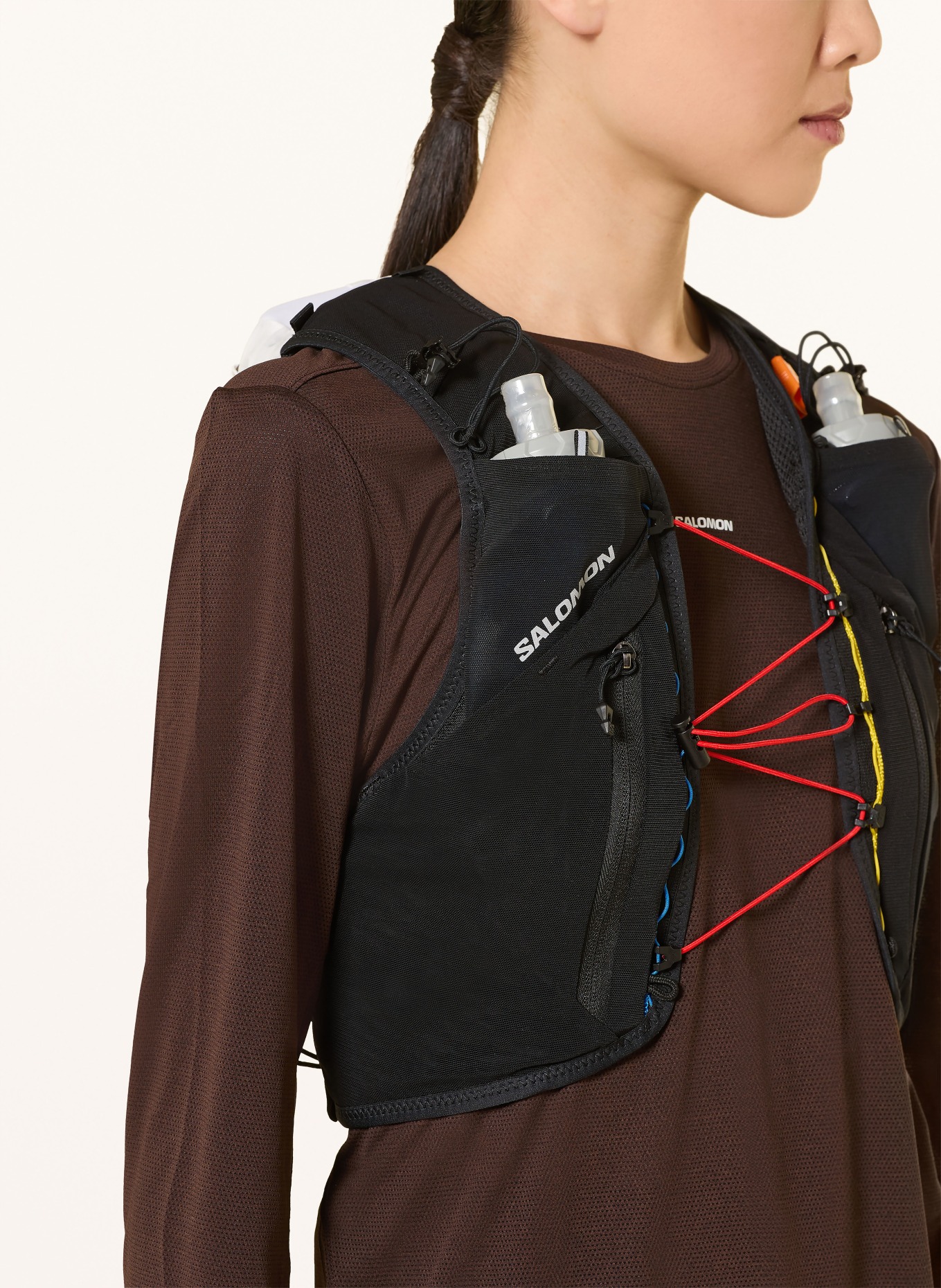 SALOMON Běžecká vesta ADV SKIN 12 RACE FLAG: ČERNÁ / BÍLÁ