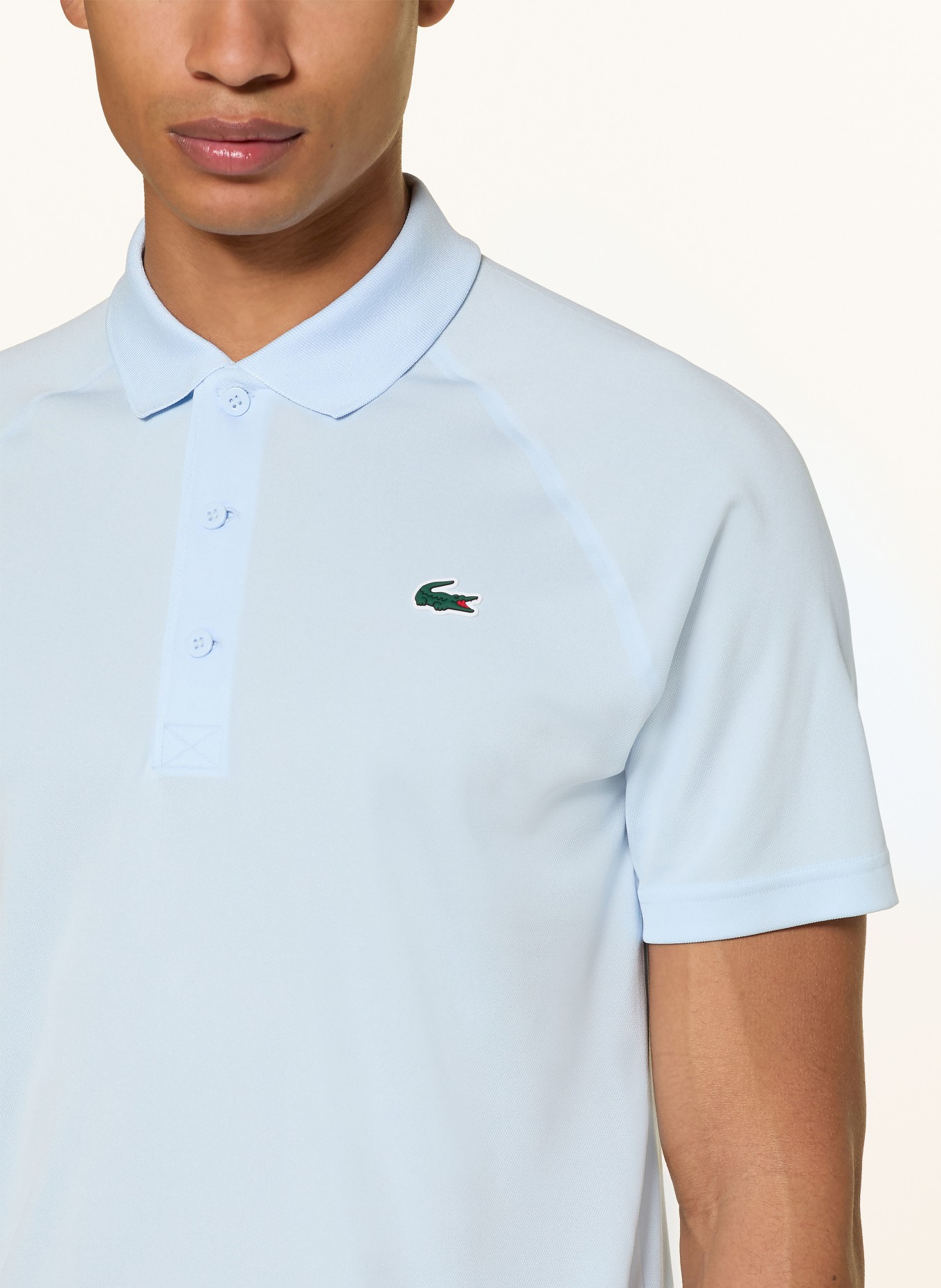 LACOSTE Polo fonctionnel: BLEU CLAIR / VERT