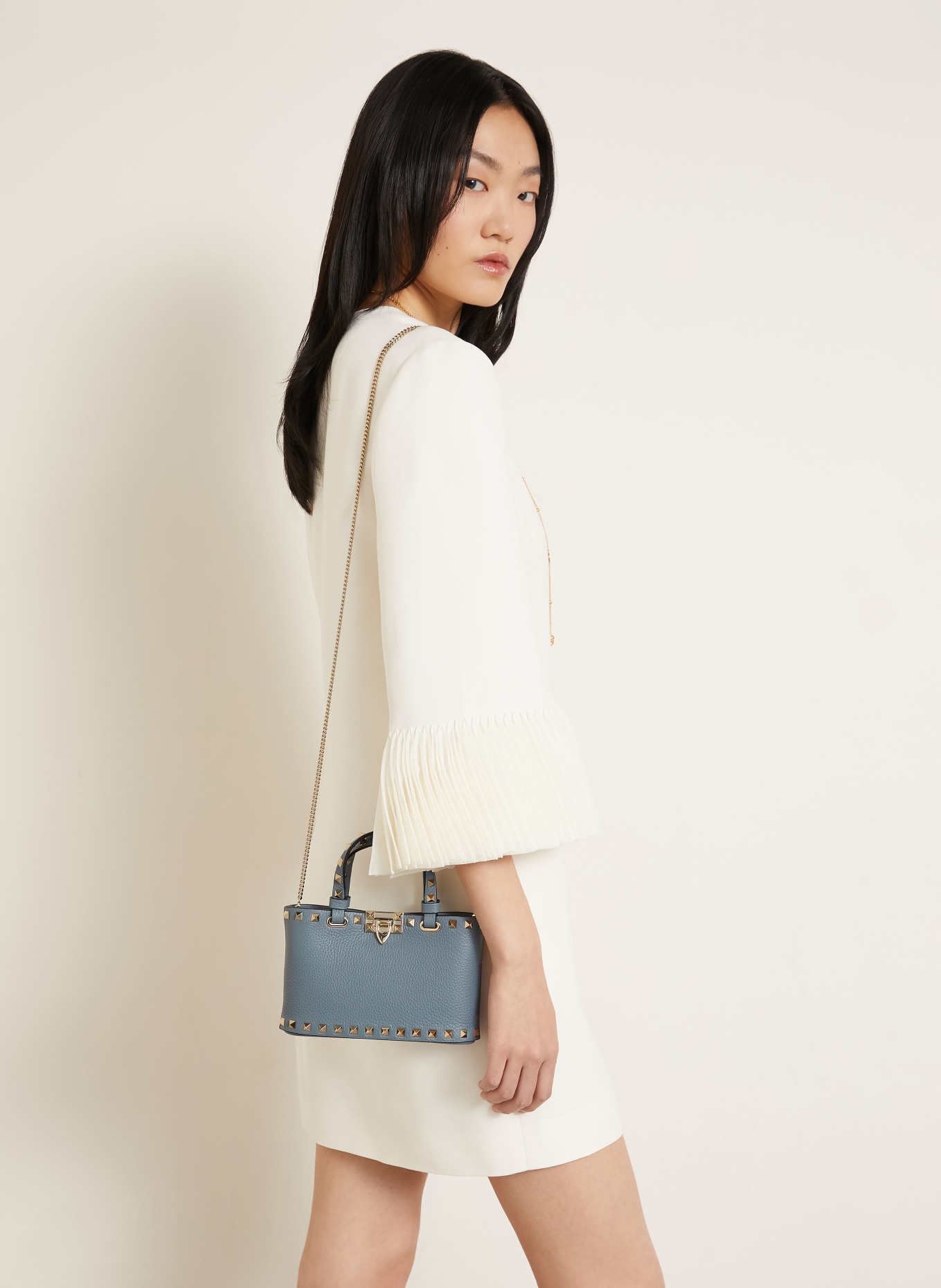 VALENTINO GARAVANI Kabelka ROCKSTUD MINI: ČERNOŠEDÁ