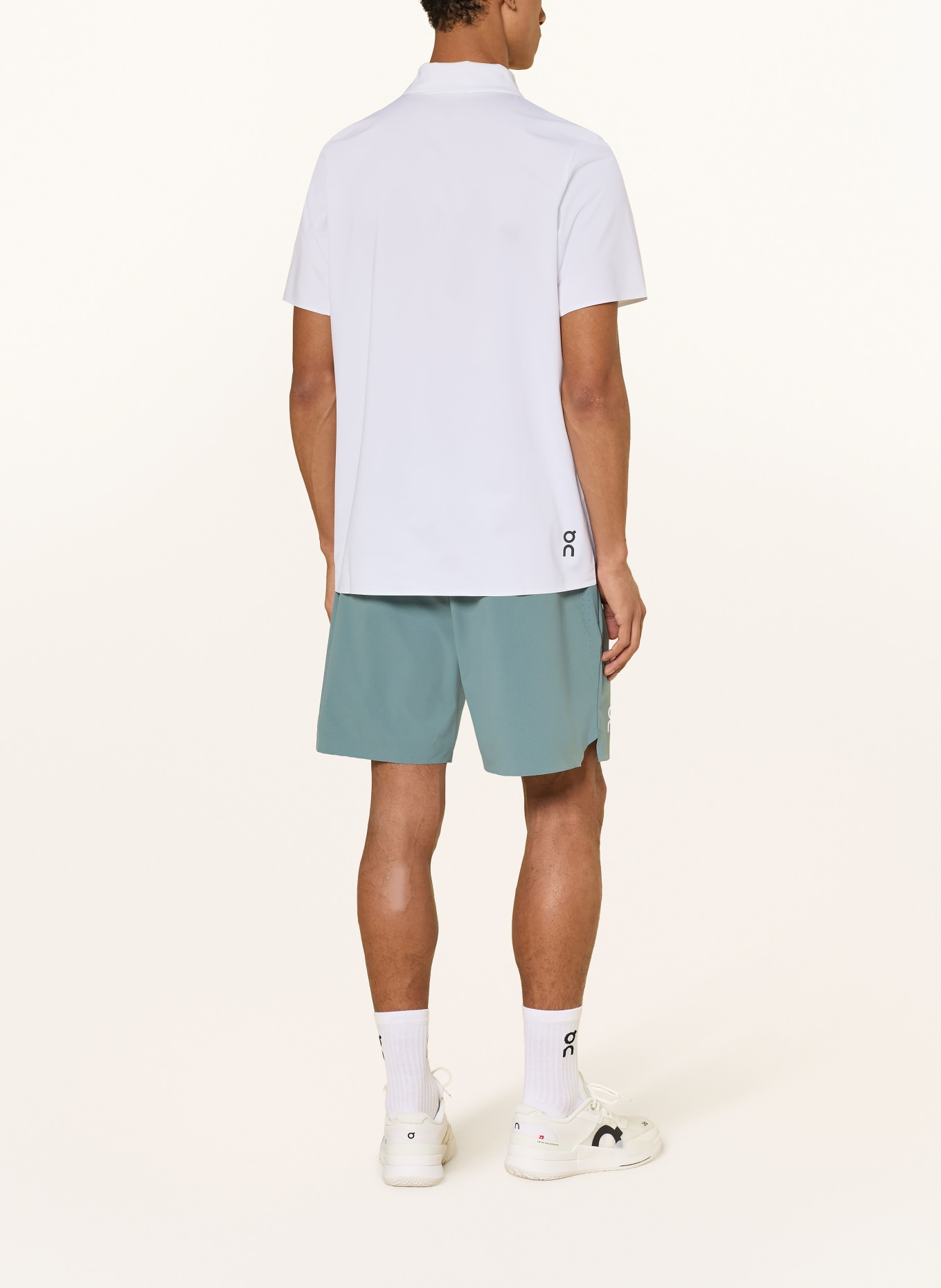 On Tennisshorts COURT: PETROL