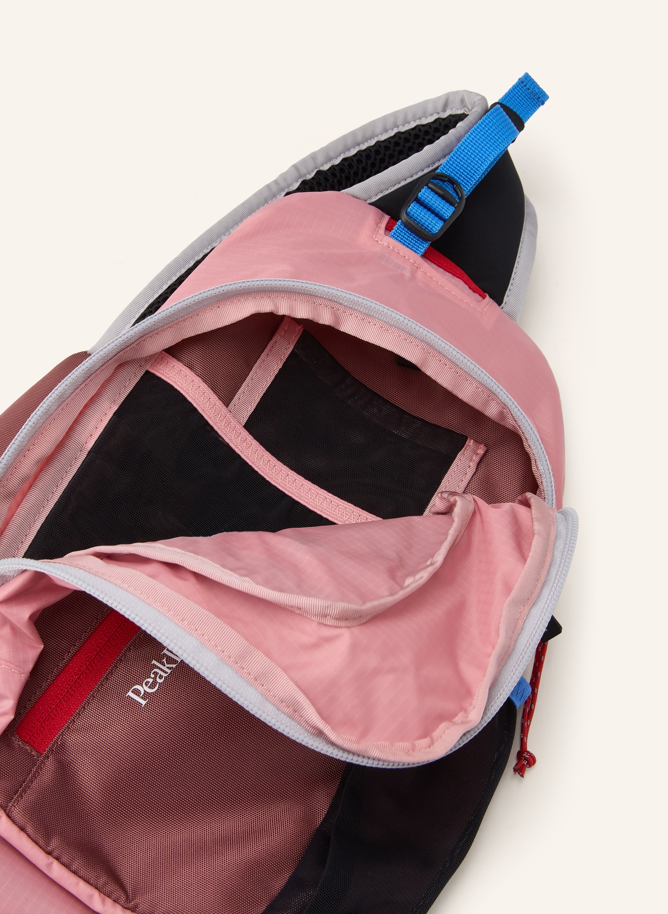 Peak Performance Sac à bandoulière OUTDOOR SLINGBACK: ROUGE CLAIR / BLEU / NOIR