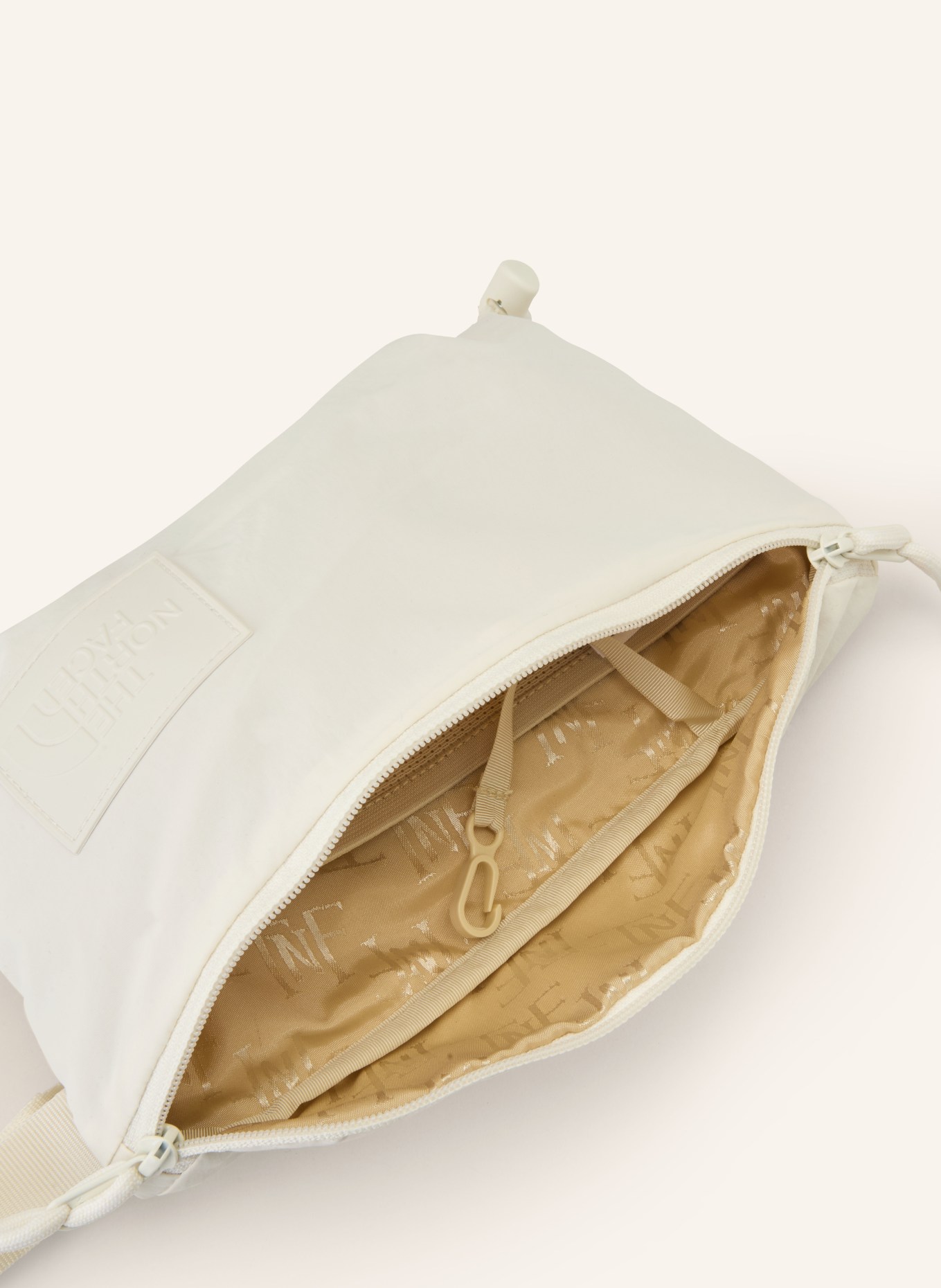 THE NORTH FACE Gürteltasche NEVER STOP: ECRU