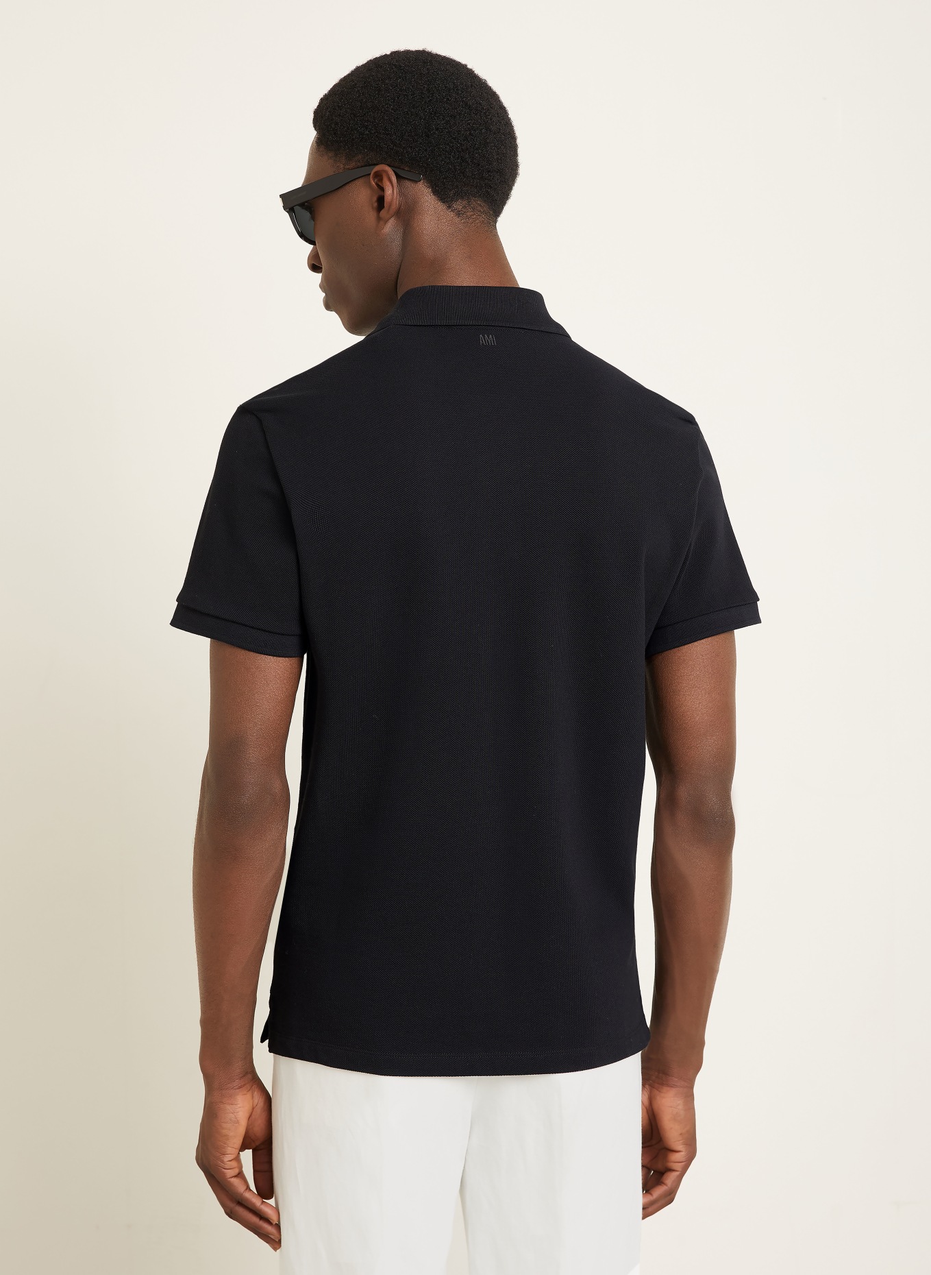 AMI PARIS Polo piqué: NOIR / BLANC