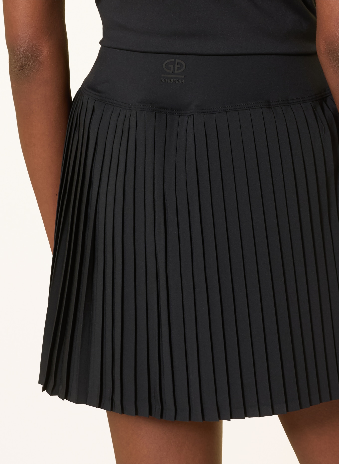 GOLDBERGH Tennisrock PLISS: SCHWARZ