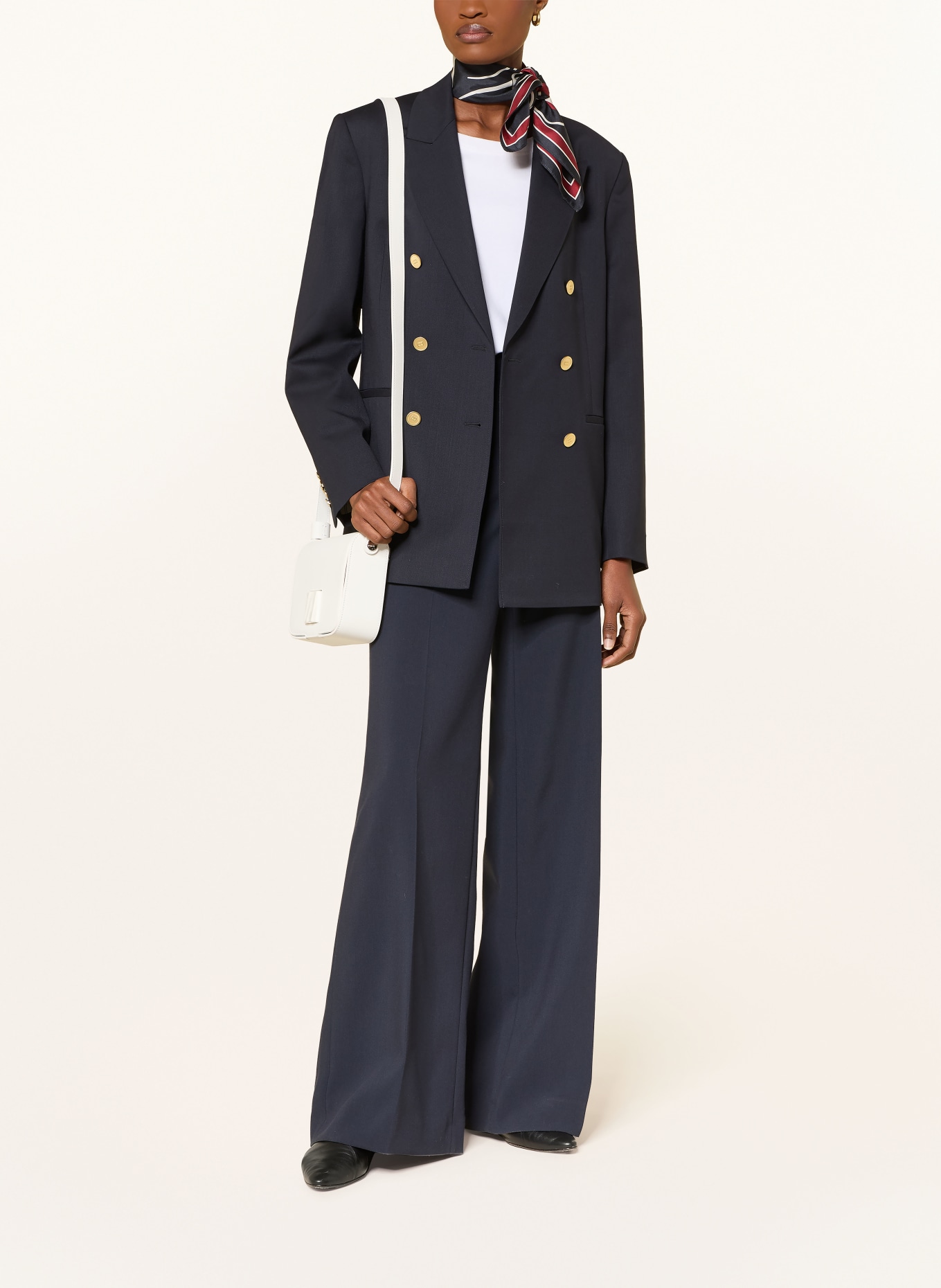 TUMI OLAS schoudertas SMALL: WIT / ZILVER