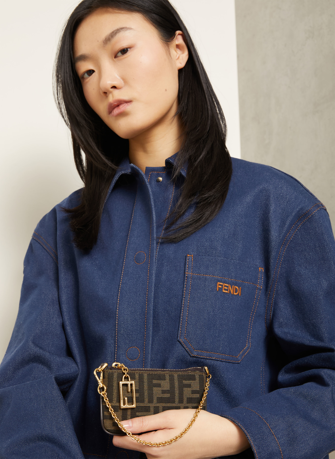 FENDI clutch: DARK BROWN / GOLD