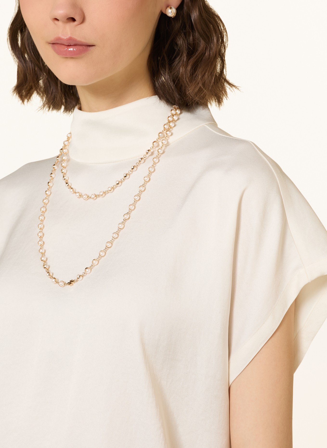 TORY BURCH ketting: CRÈME / GOUD
