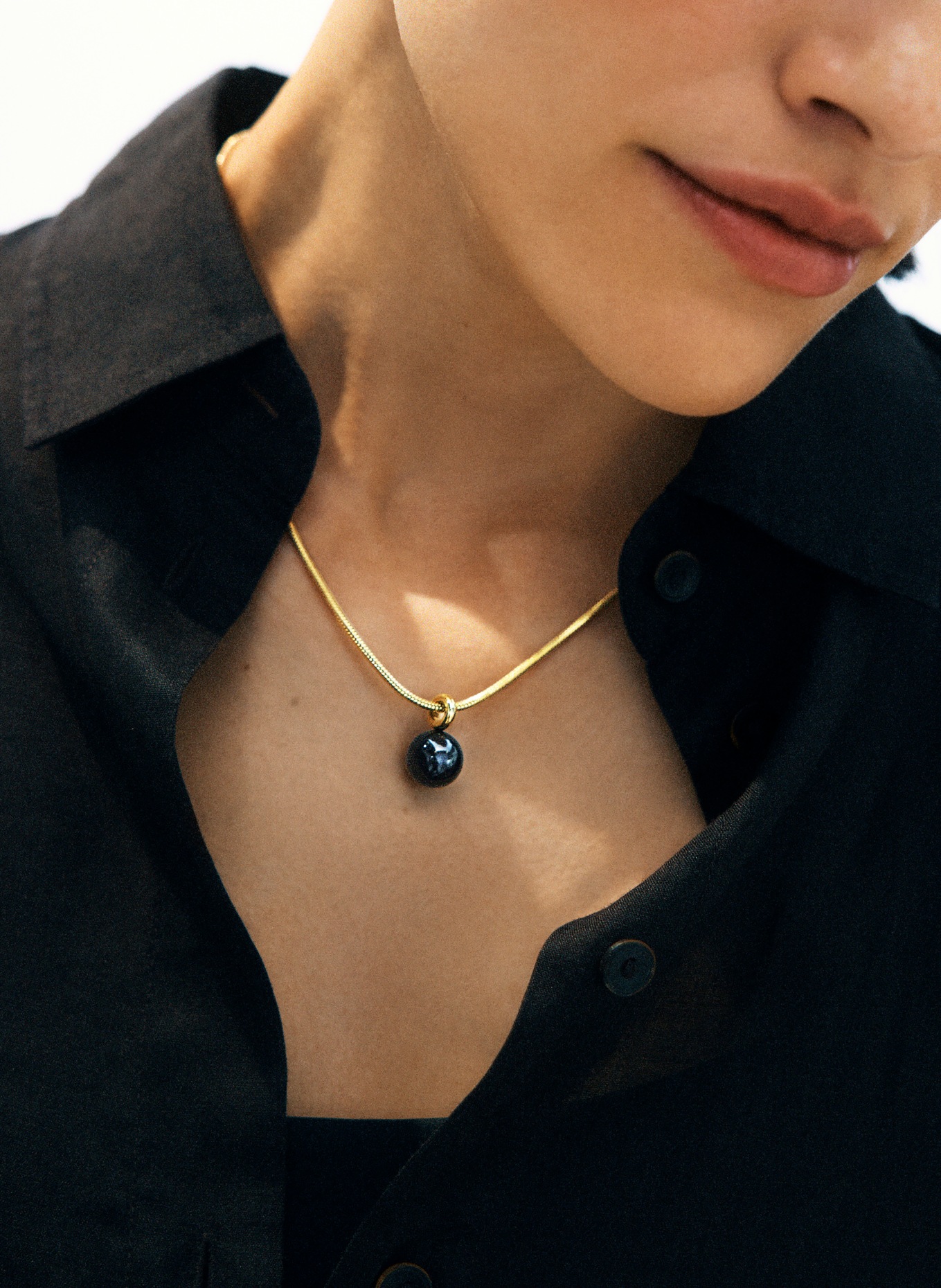 EDBLAD Collier AURA L: OR / NOIR