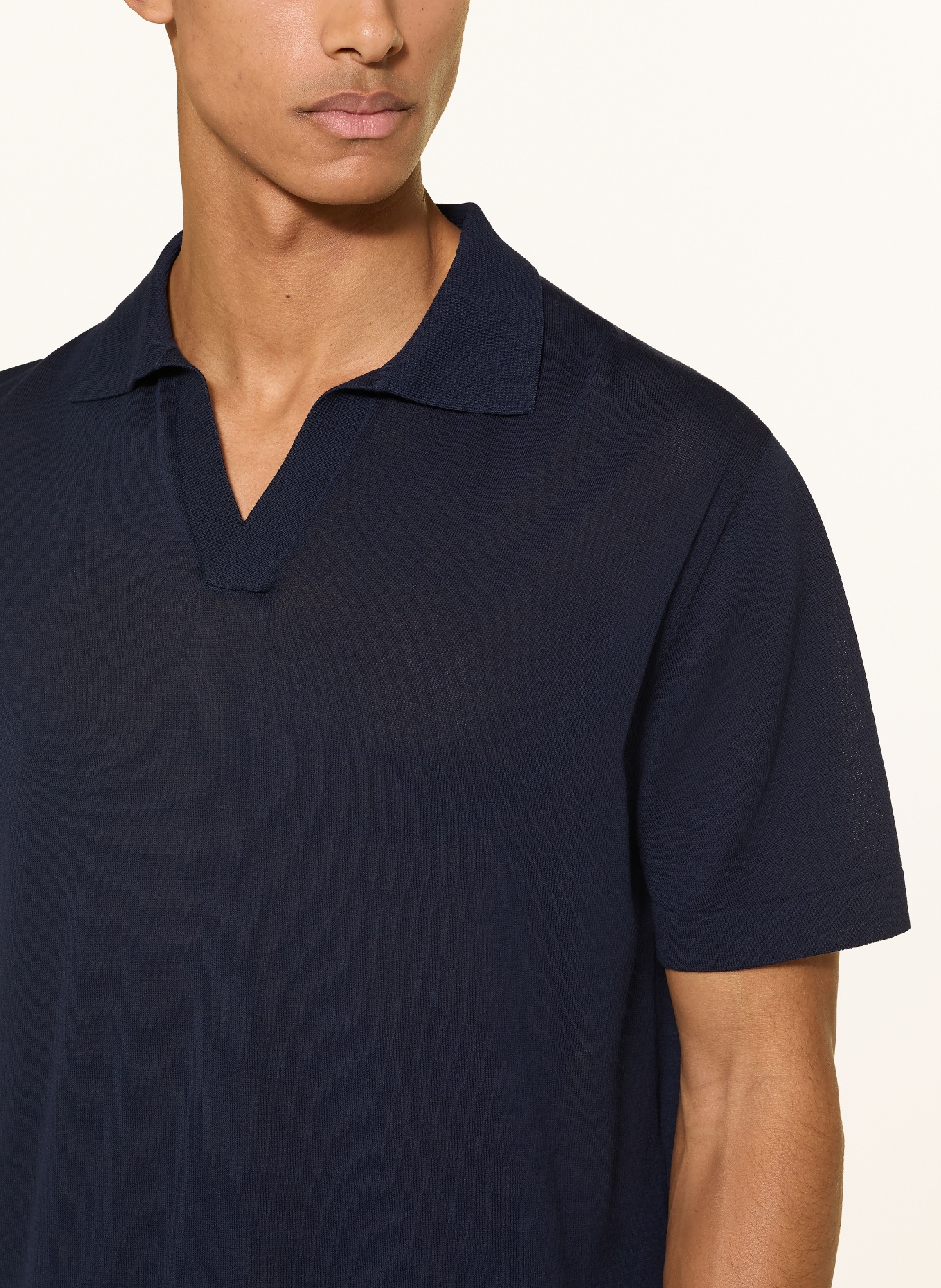 CRUNA Polo en maille: NOIR