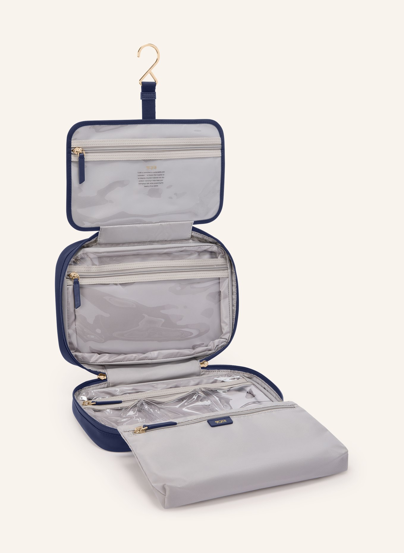 TUMI VOYAGEUR Kosmetiktasche MADELINE: DUNKELBLAU / GOLD