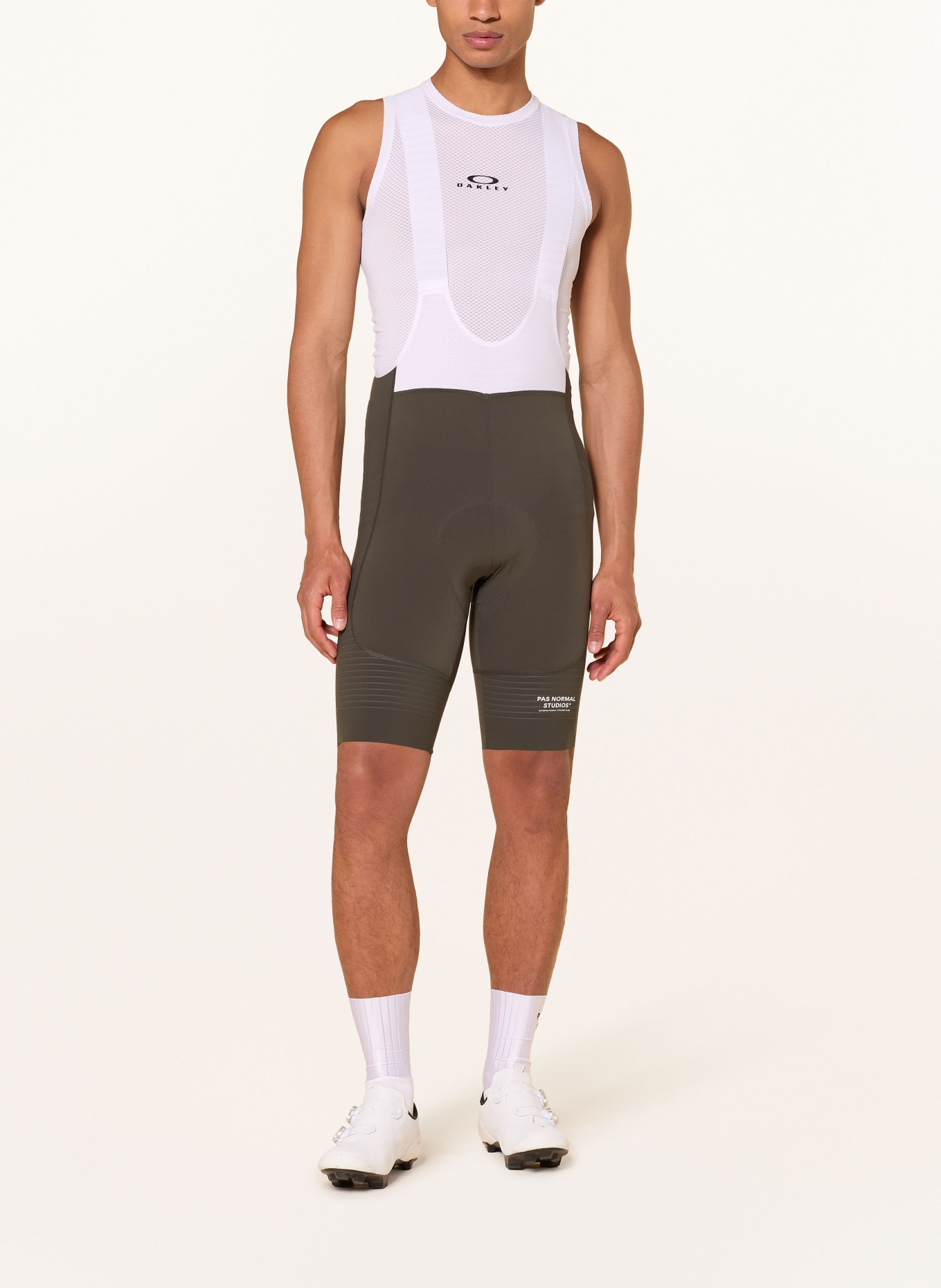 PAS NORMAL STUDIOS Radhose MECHANISM PRO mit Trägern und gepolstertem Einsatz: WEISS / OLIV