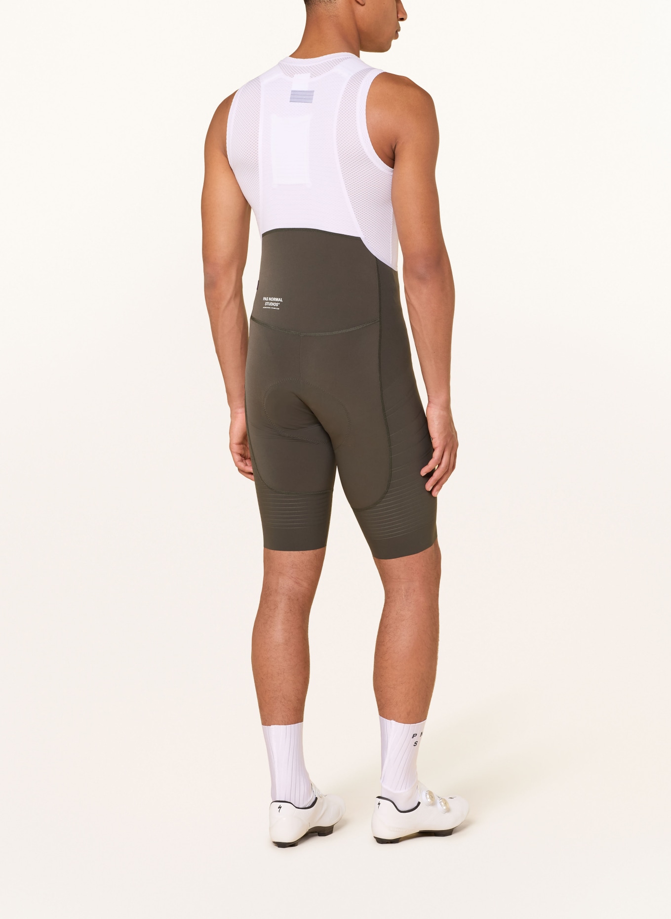 PAS NORMAL STUDIOS Cycling shorts MECHANISM PRO with straps and padded insert: WHITE / OLIVE