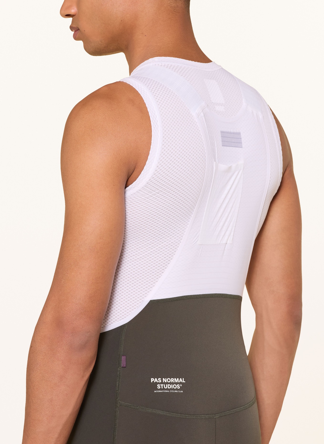 PAS NORMAL STUDIOS Cycling shorts MECHANISM PRO with straps and padded insert: WHITE / OLIVE