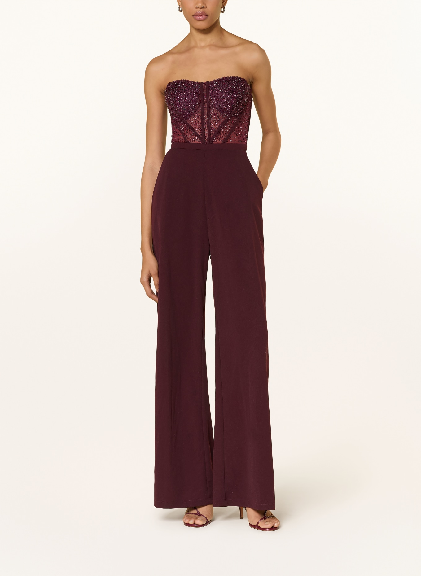 Hey Kyla Off-shoulder jumpsuit with decorative gems: DARK RED