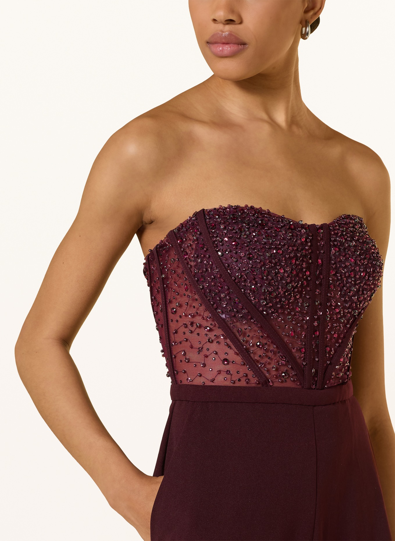 Hey Kyla Off-shoulder jumpsuit with decorative gems: DARK RED